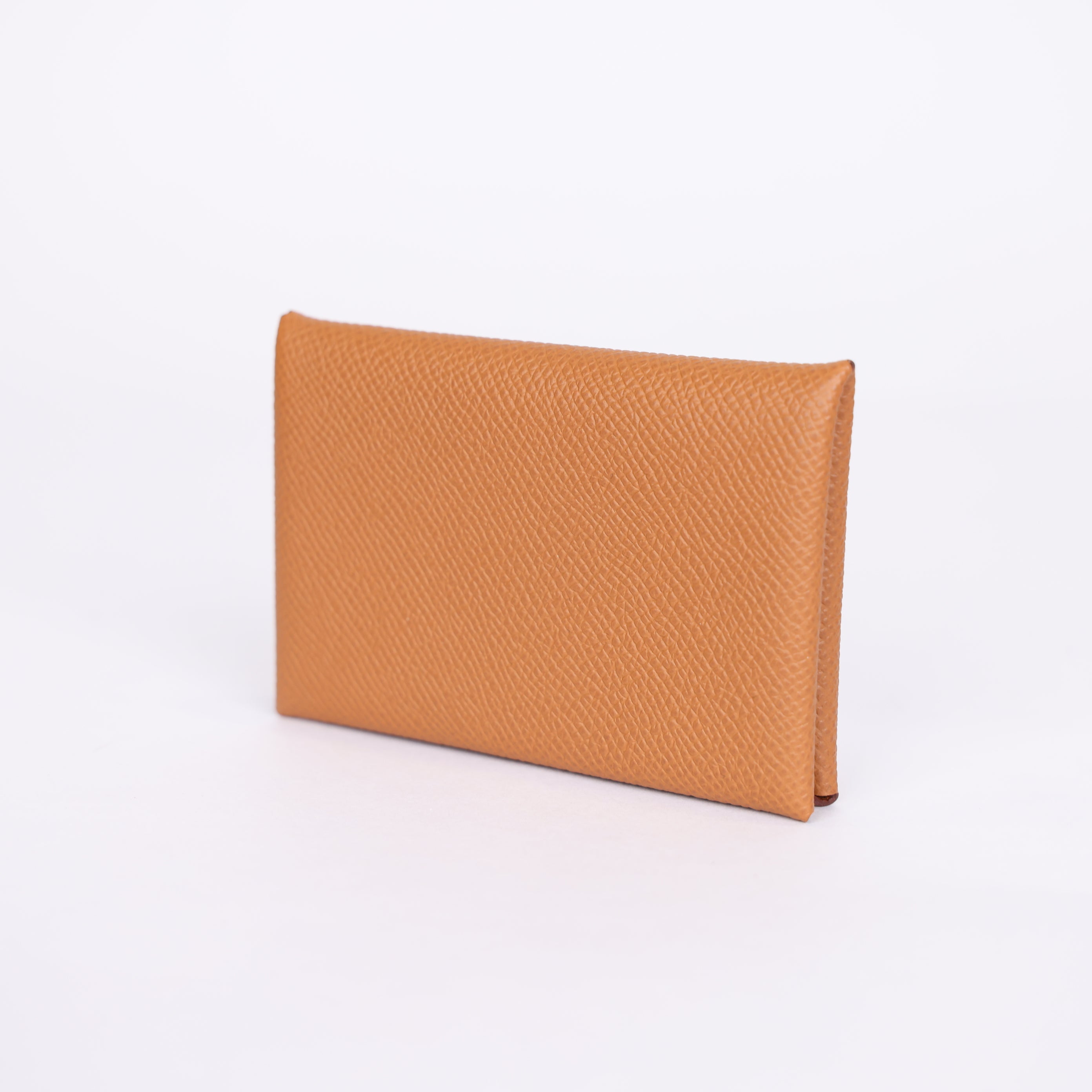 PRE OWNED- HERMES Epsom Calvi Card Case in Gold J0401B62131