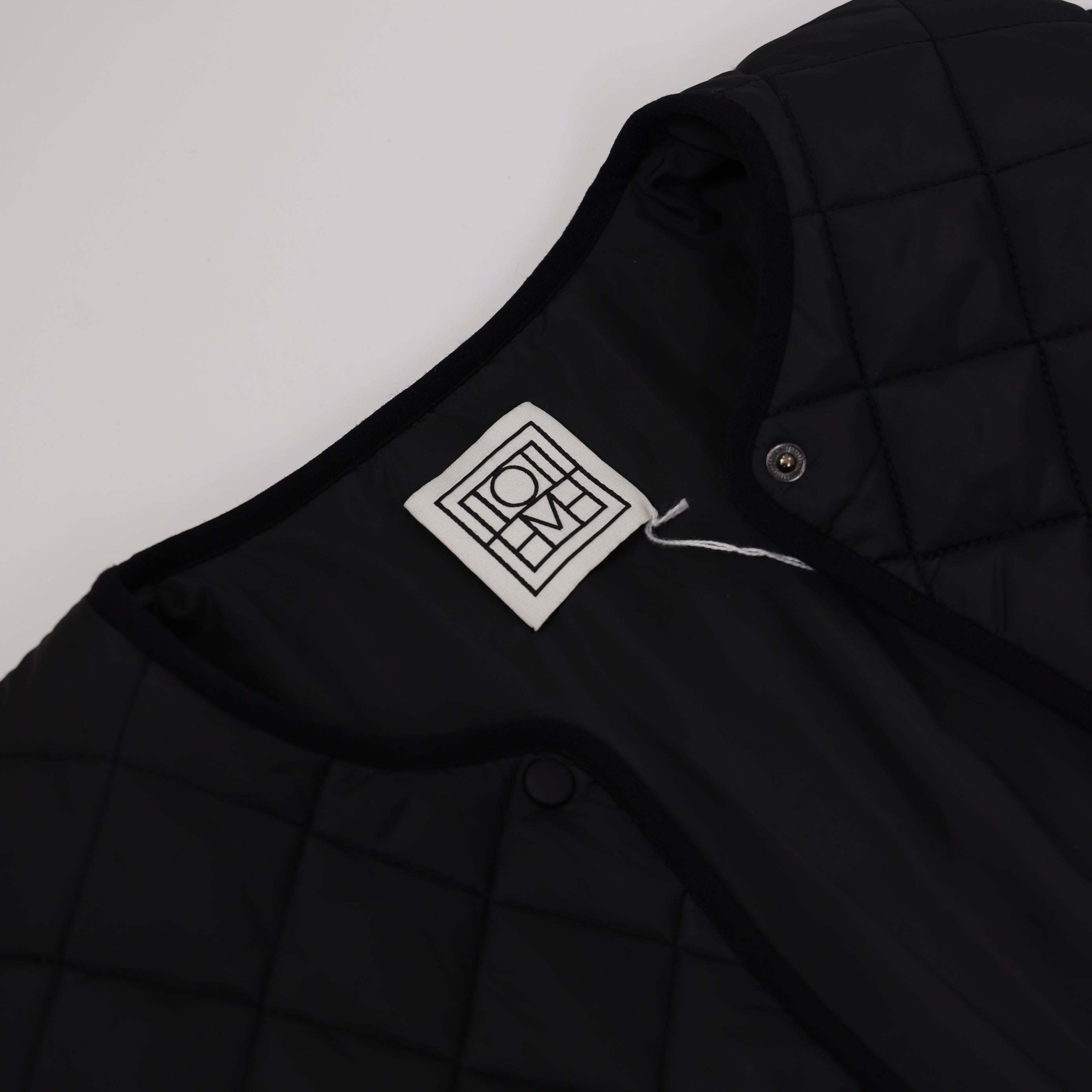 PRE OWNED- Toteme Black quilted shell jacket S