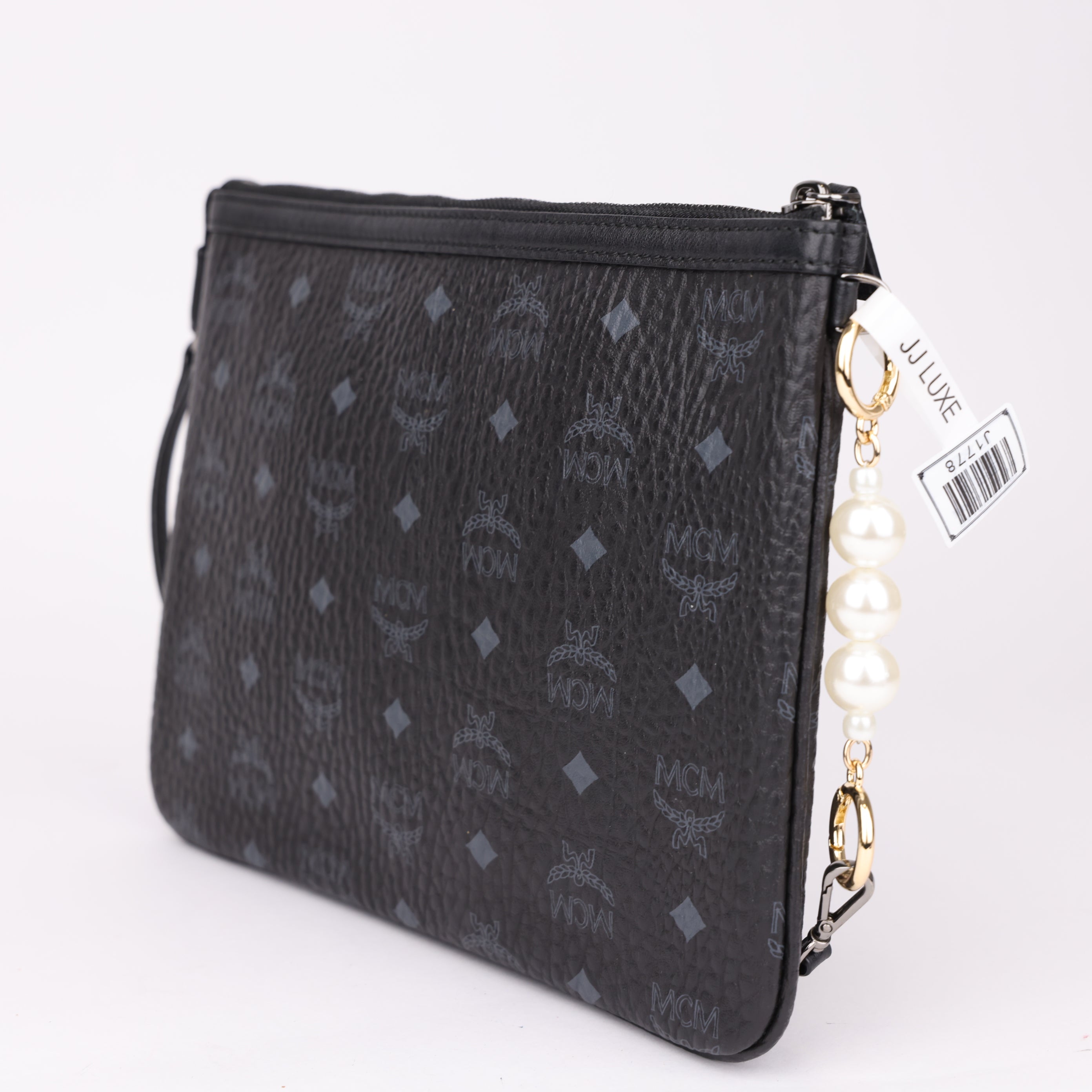 J1778 MCM Medium Crossbody Pouch Black- Pre Owned