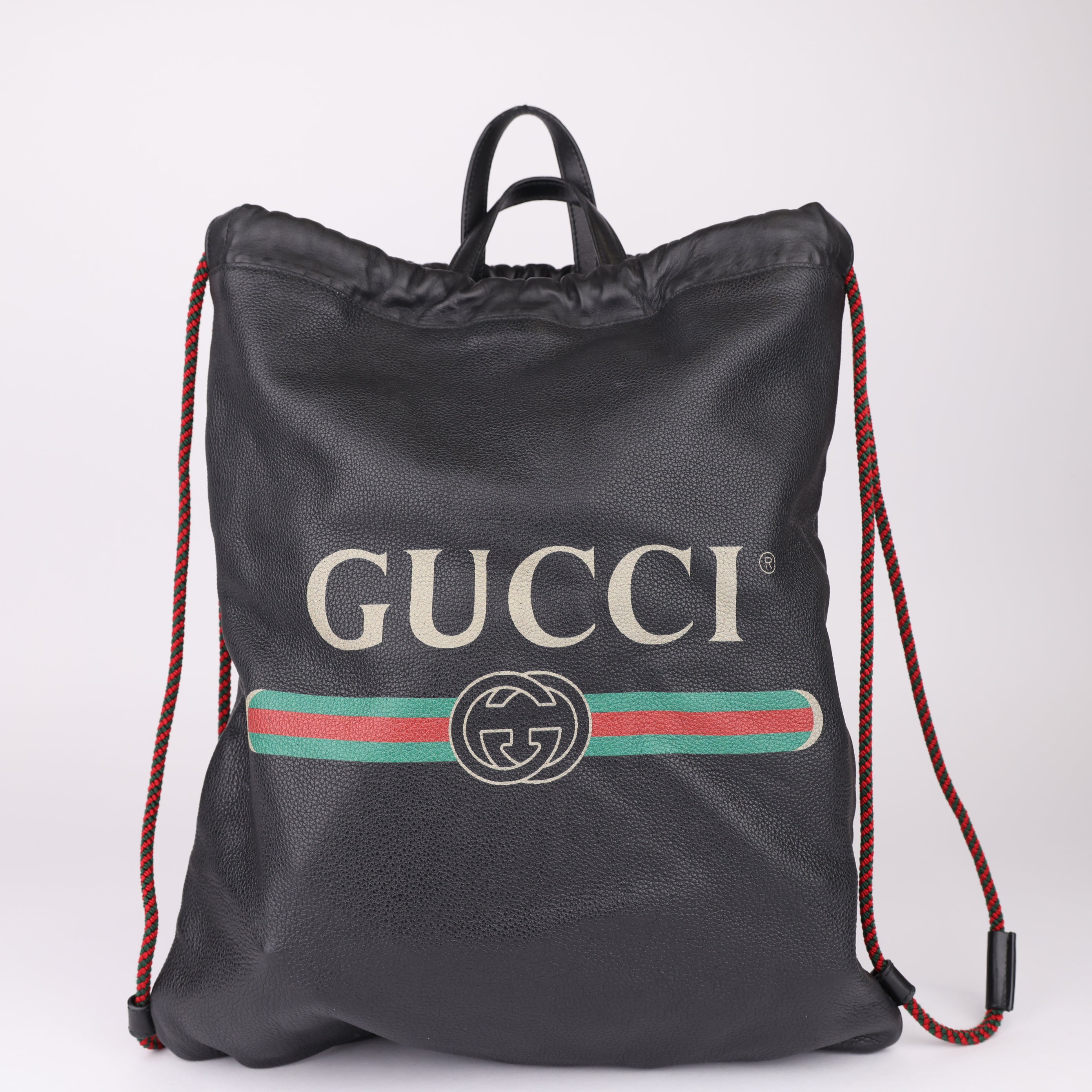 J1619 Gucci Print leather Drawstring Backpack- Pre Owned