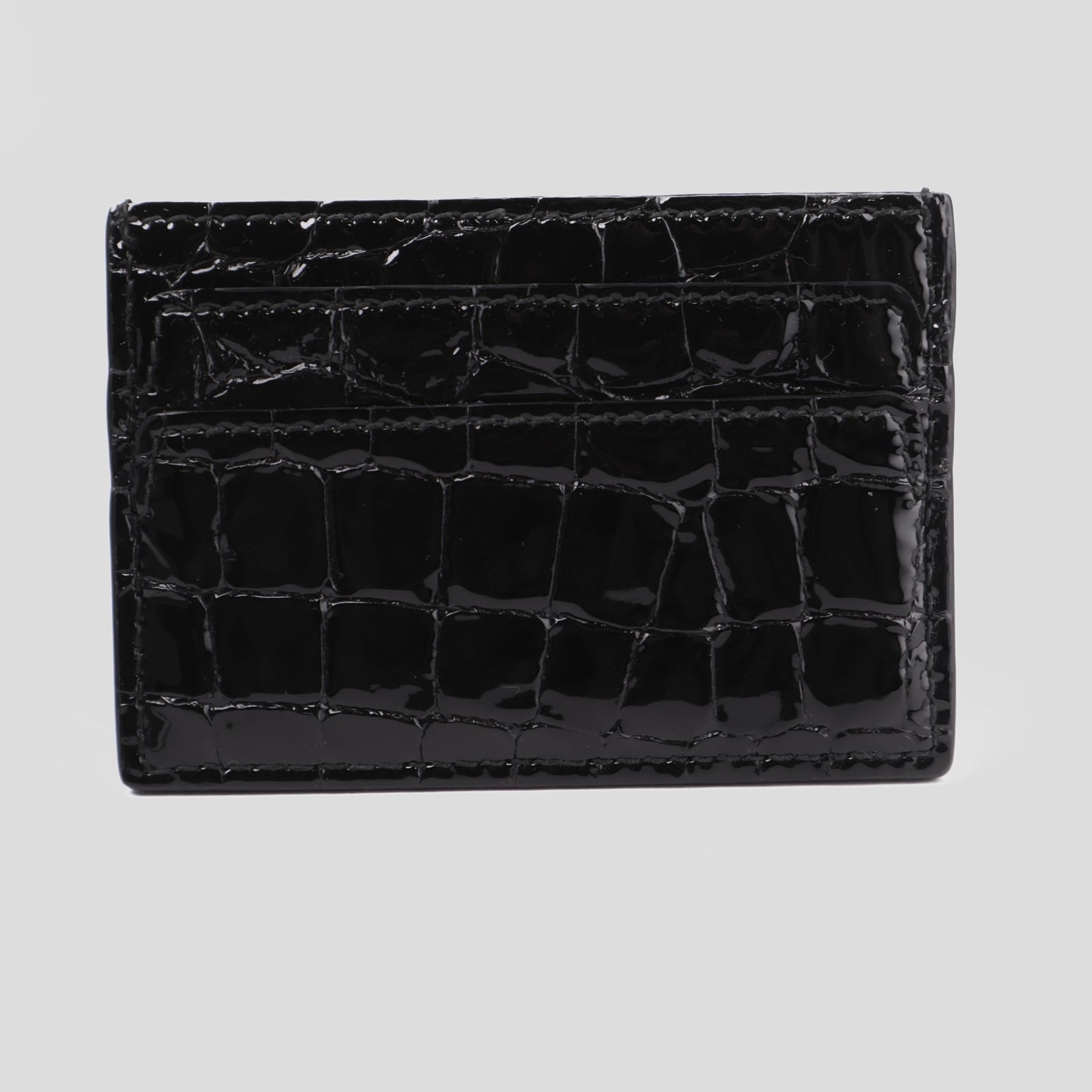 J3659-ALEXANDER MCQUEEN Black skull-embellished leather card holder- Pre Owned