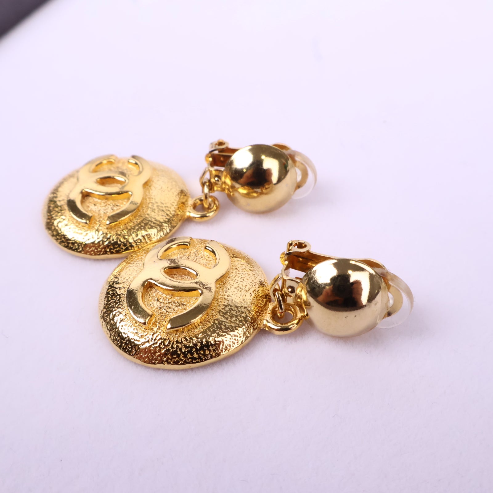 J3088 Chanel Clip-On Earrings CC Dangle Drop Button | Pre-Owned Metal CC motif