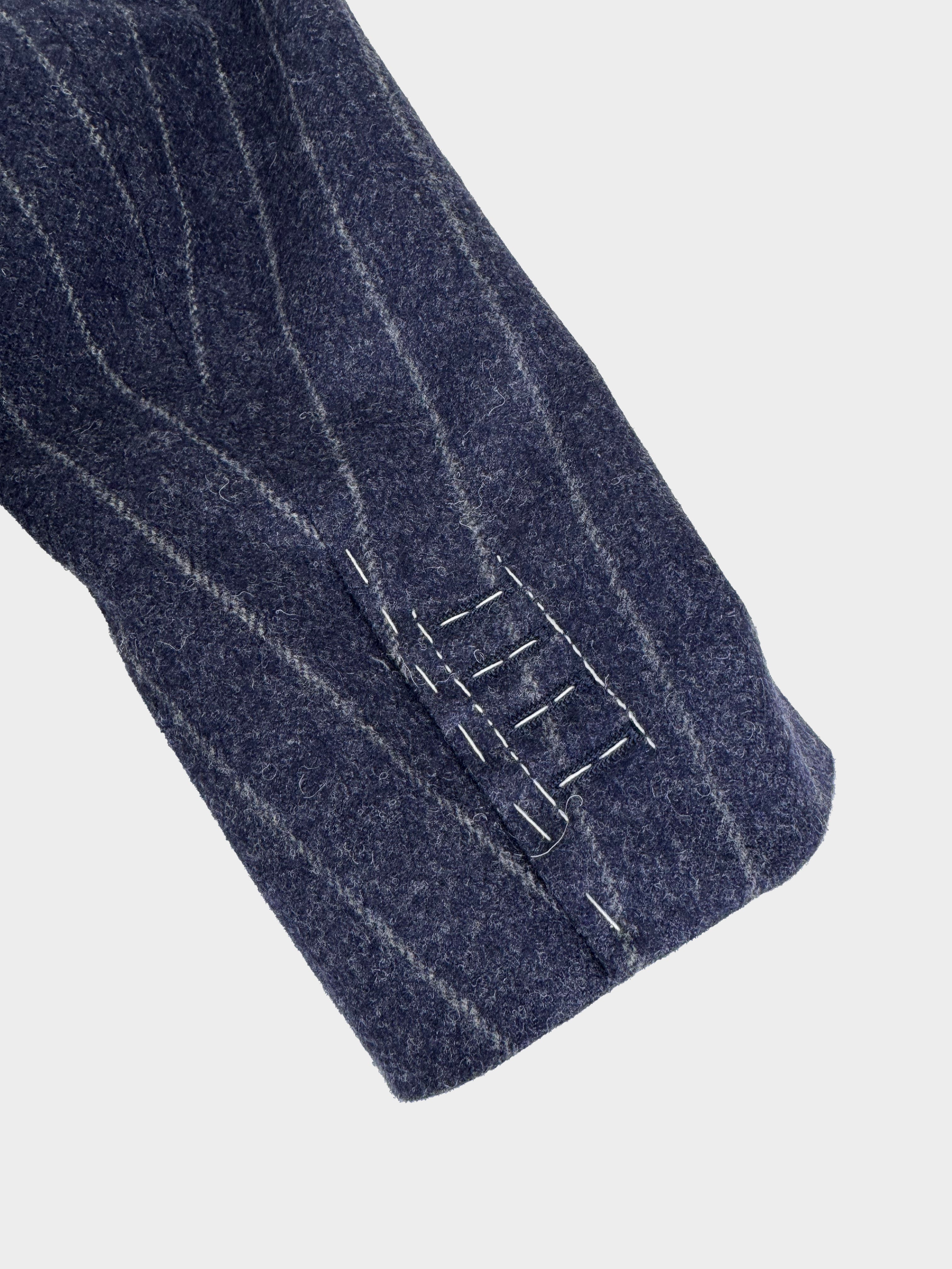 PRE OWNED - MAISON MARGIELA
MM1 DOUBLE-BREASTED PEAK LAPEL PINSTRIPED BLAZER