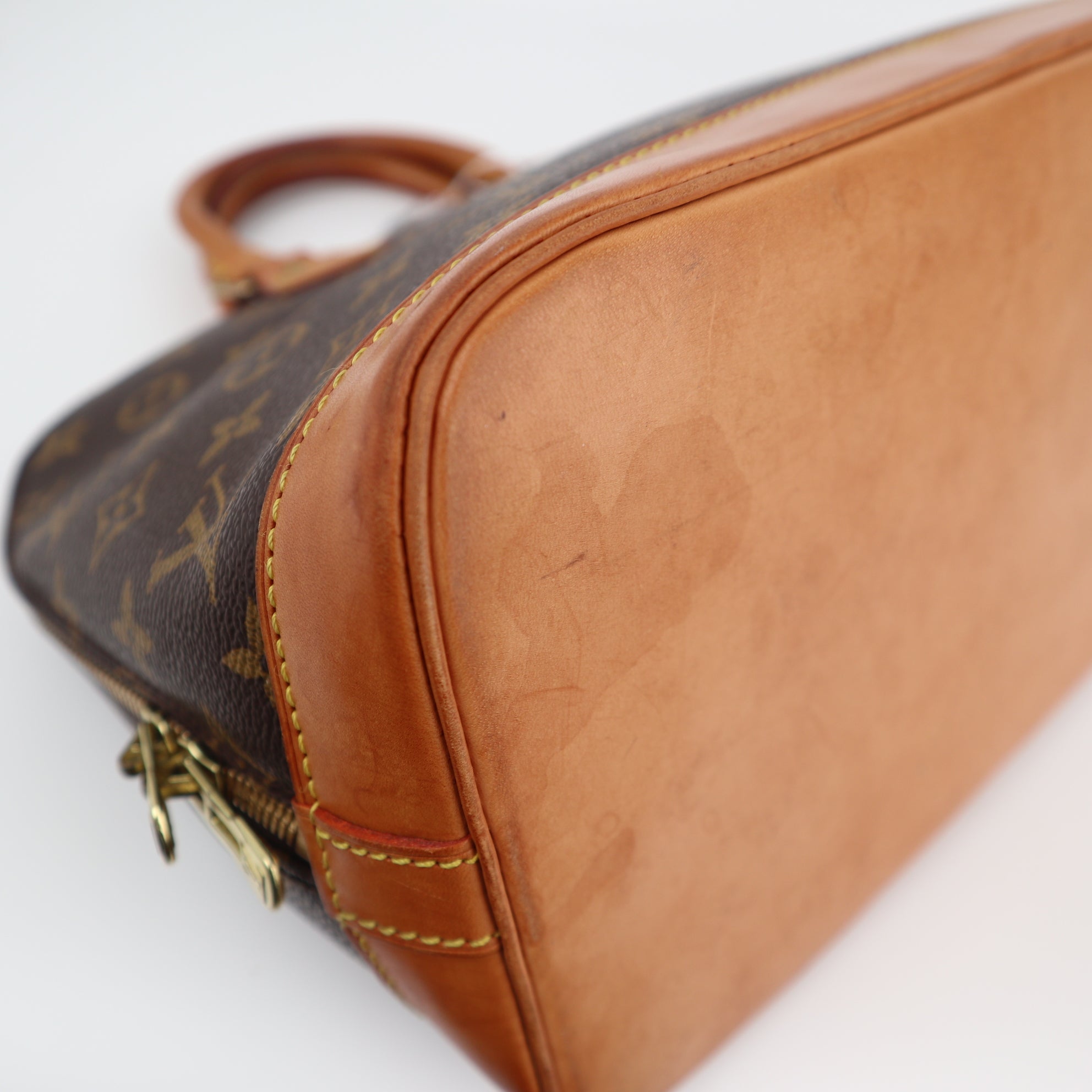 Louis Vuitton Monogram Canvas Alma PM Top Handle Bag C1857 | Pre-Owned Very Good Brown Monogram Coated canvas, leather trim