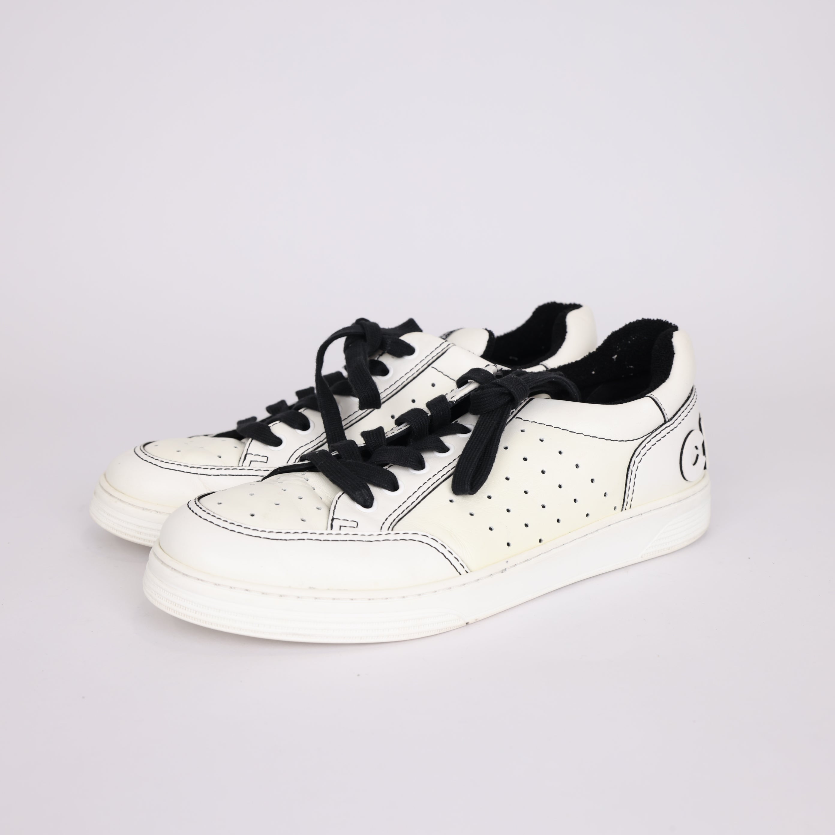 PRE OWNED- Chanel black and white embossed logo sneakers MEN'S size EU41/ UK7 J0503S55521