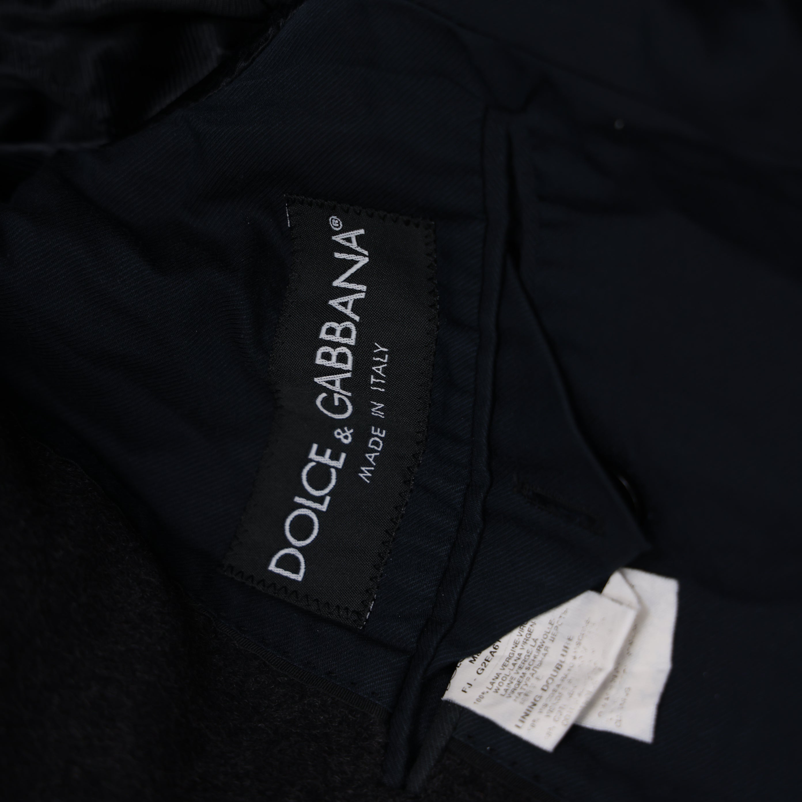 PRE OWNED- Dolce & Gabbana solid wool suit 46