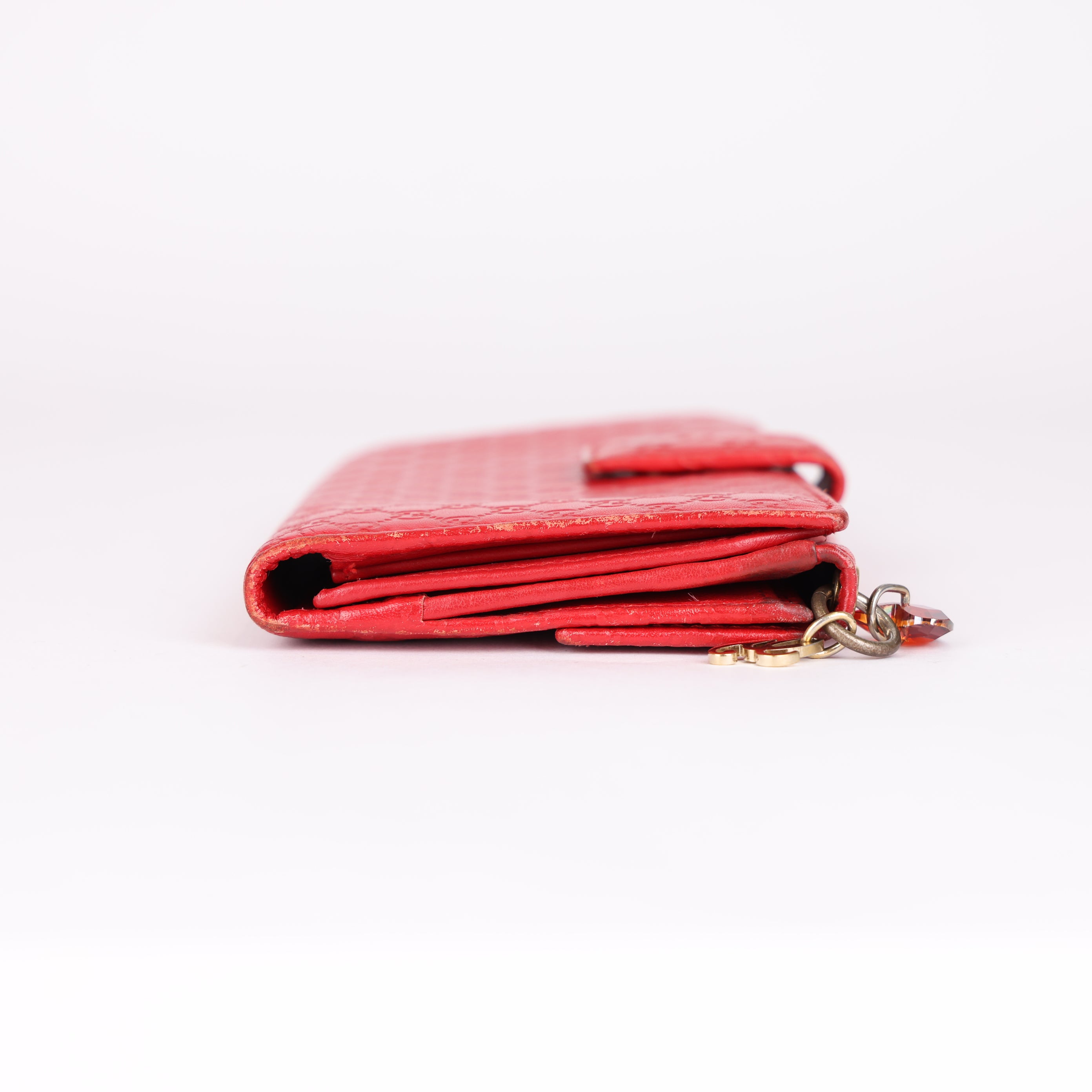 GUCCI Red GG Embossed Leather Wallet- Pre Owned