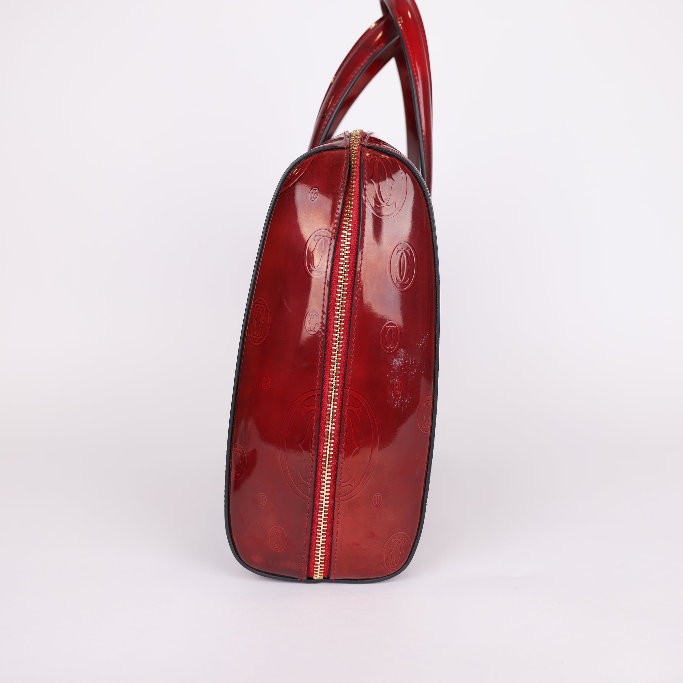 PRE OWNED-  Cartier red embossed handbag J0575B65241