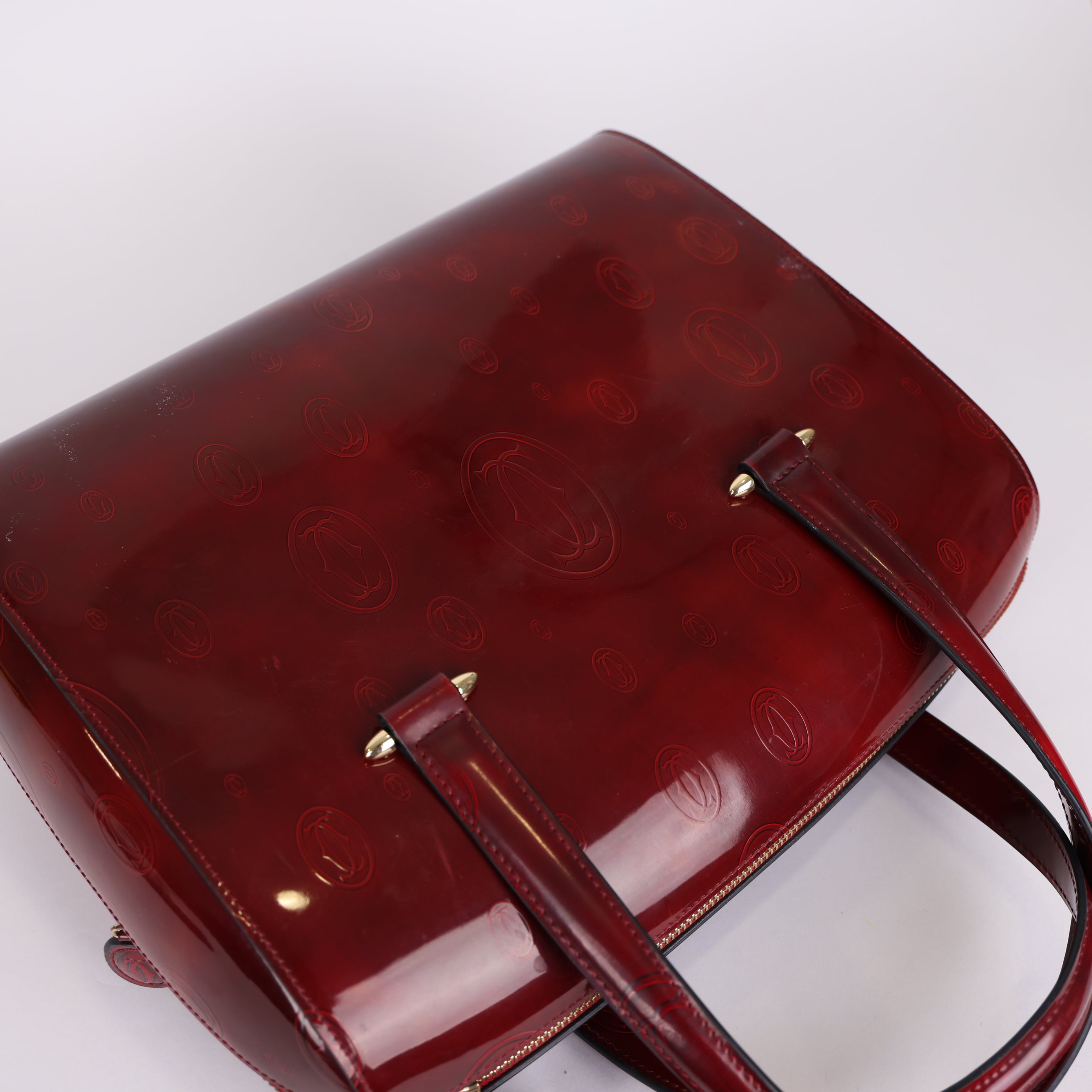 PRE OWNED-  Cartier red embossed handbag J0575B65241