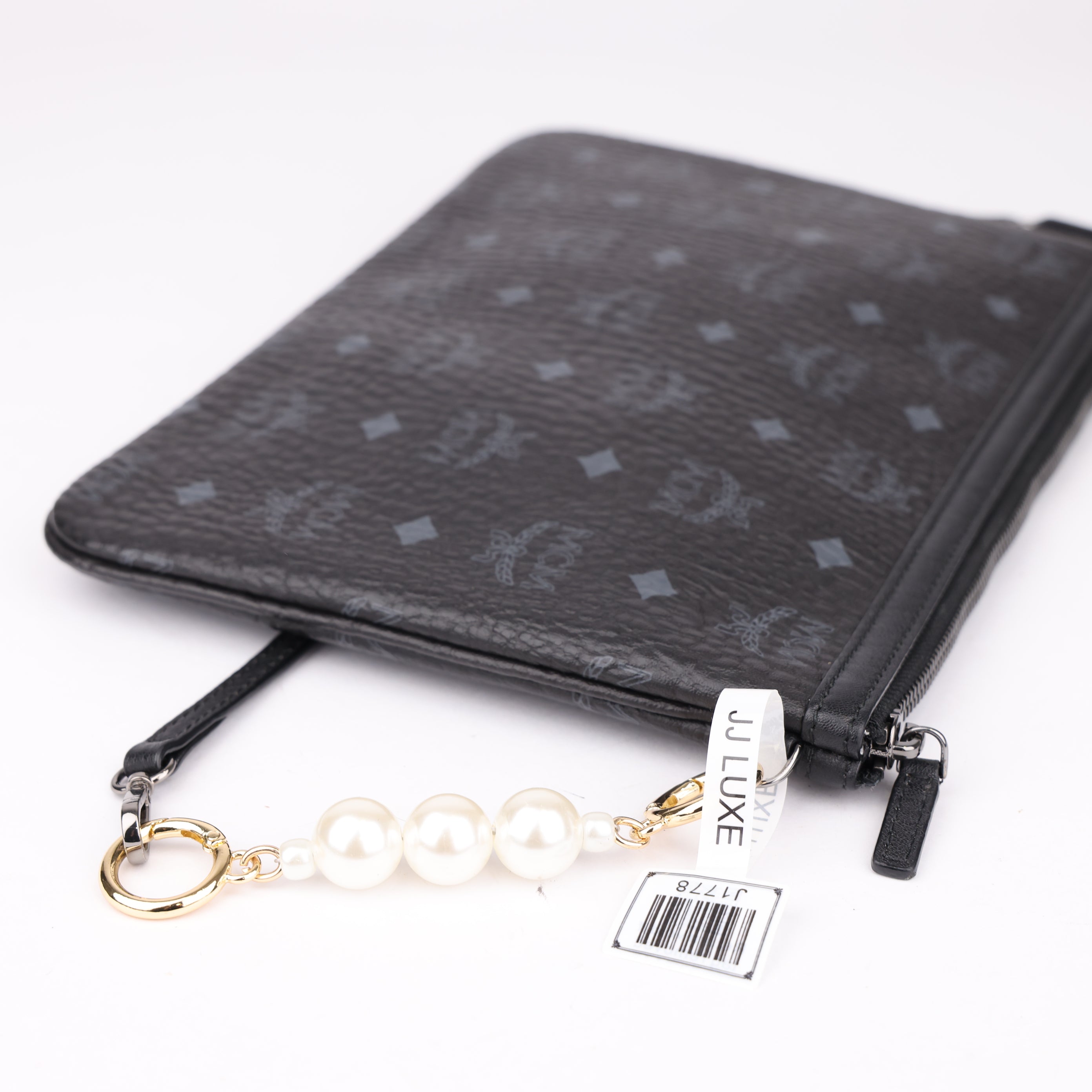 J1778 MCM Medium Crossbody Pouch Black- Pre Owned