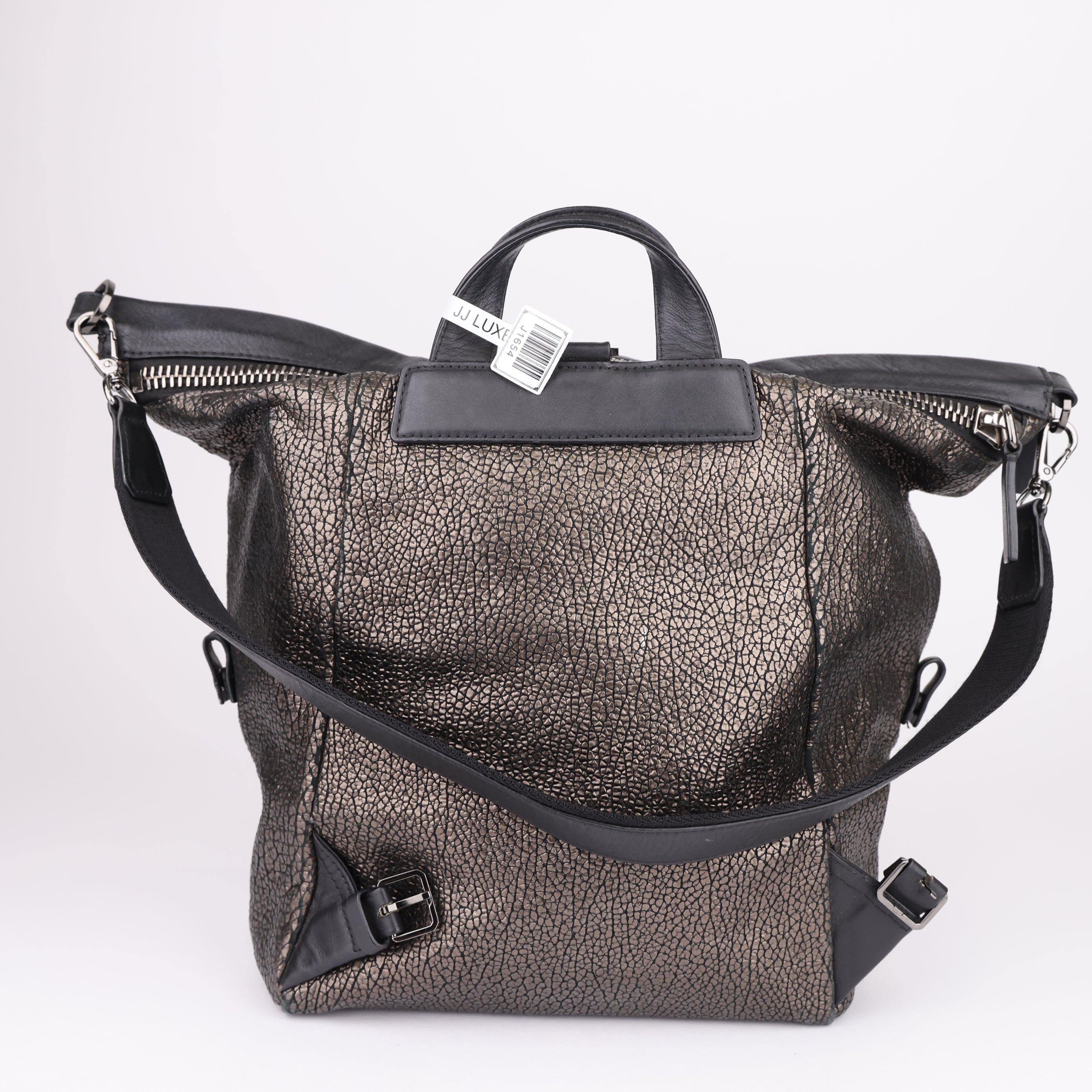 J1654 MCM Logo Plate Leather Backpack Leather Backpack- Pre Owned