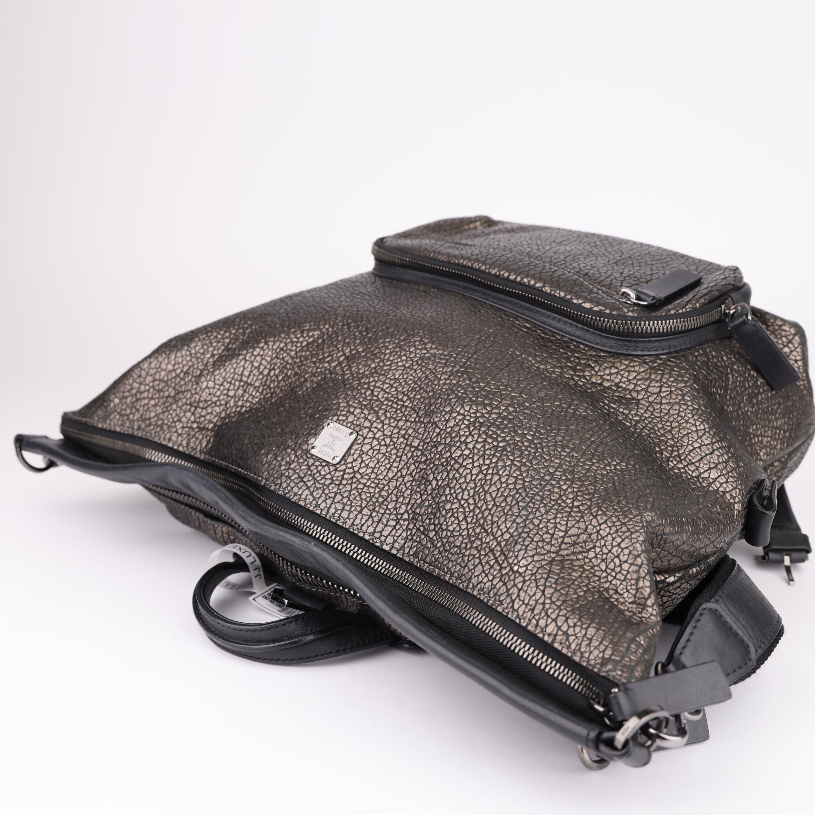 J1654 MCM Logo Plate Leather Backpack Leather Backpack- Pre Owned