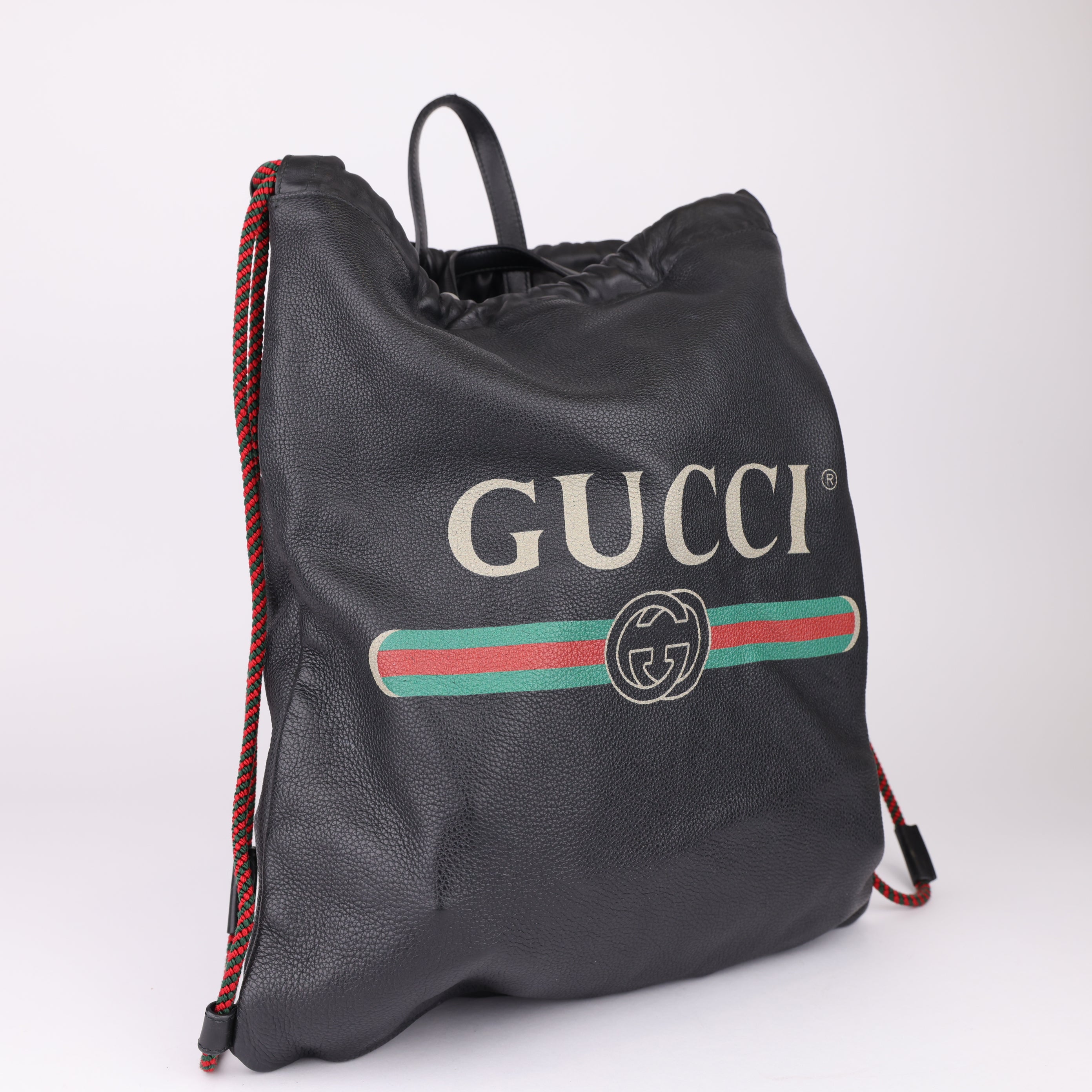 J1619 Gucci Print leather Drawstring Backpack- Pre Owned