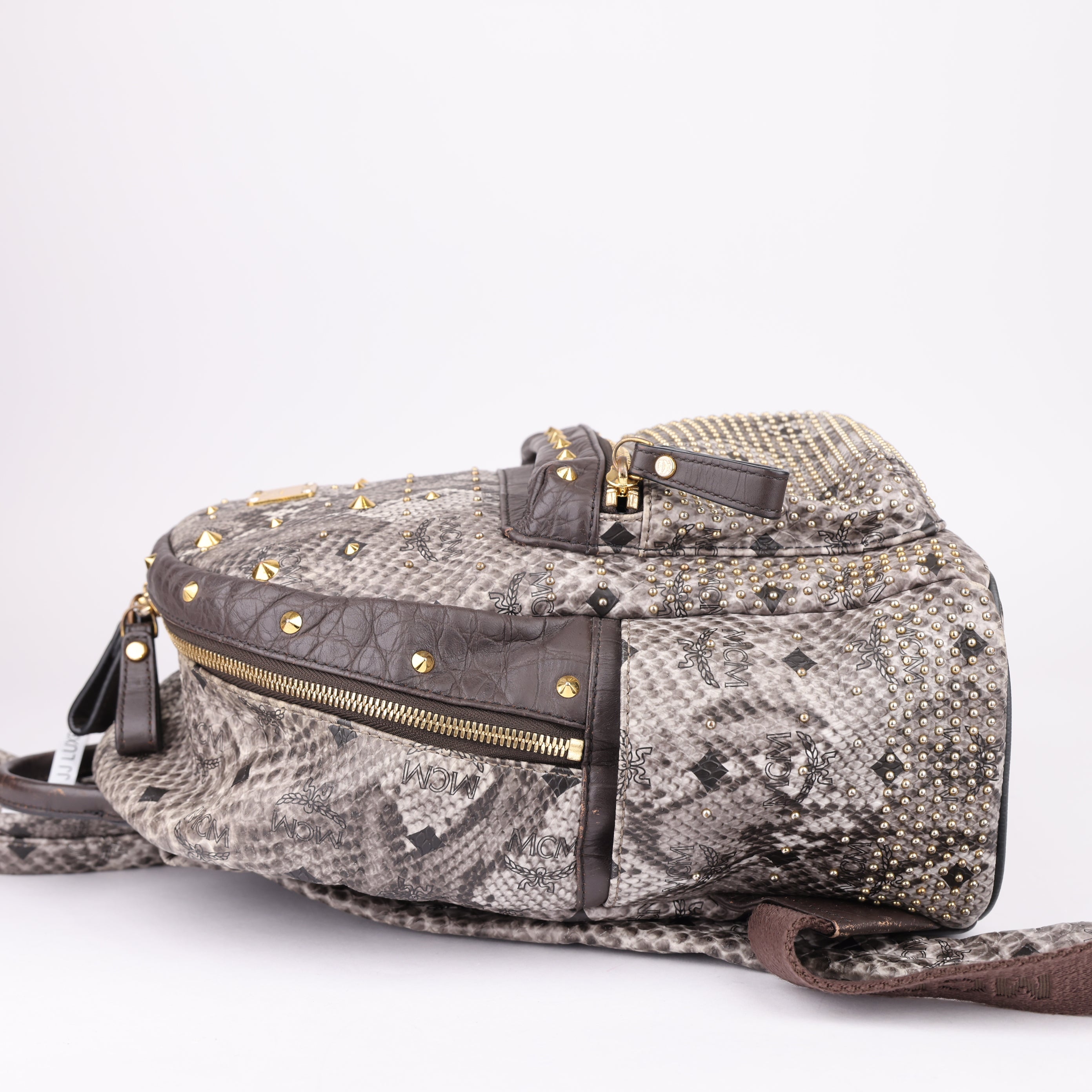 OJ1612 MCM Visetos Snakeskin Printed Studded Small Stark Backpack- Pre Owned