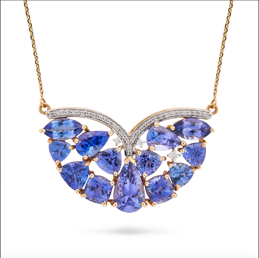 A TANZANITE AND DIAMOND NECKLACE