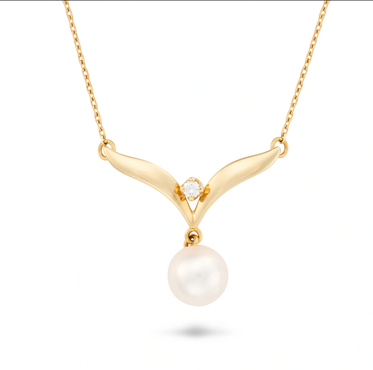 MIKIMOTO, A PEARL AND DIAMOND PENDANT NECKLACE