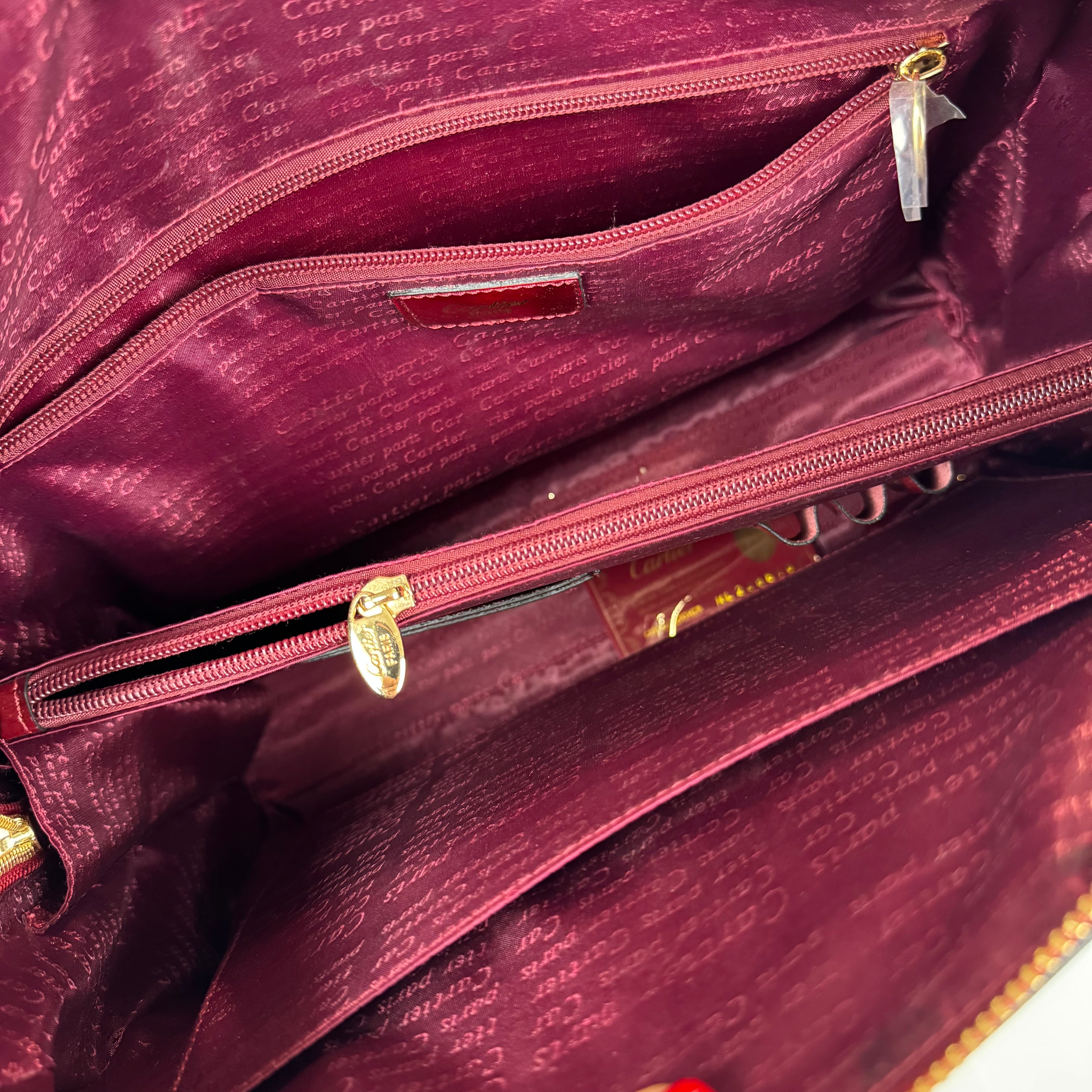 PRE OWNED-  Cartier red embossed handbag J0575B65241