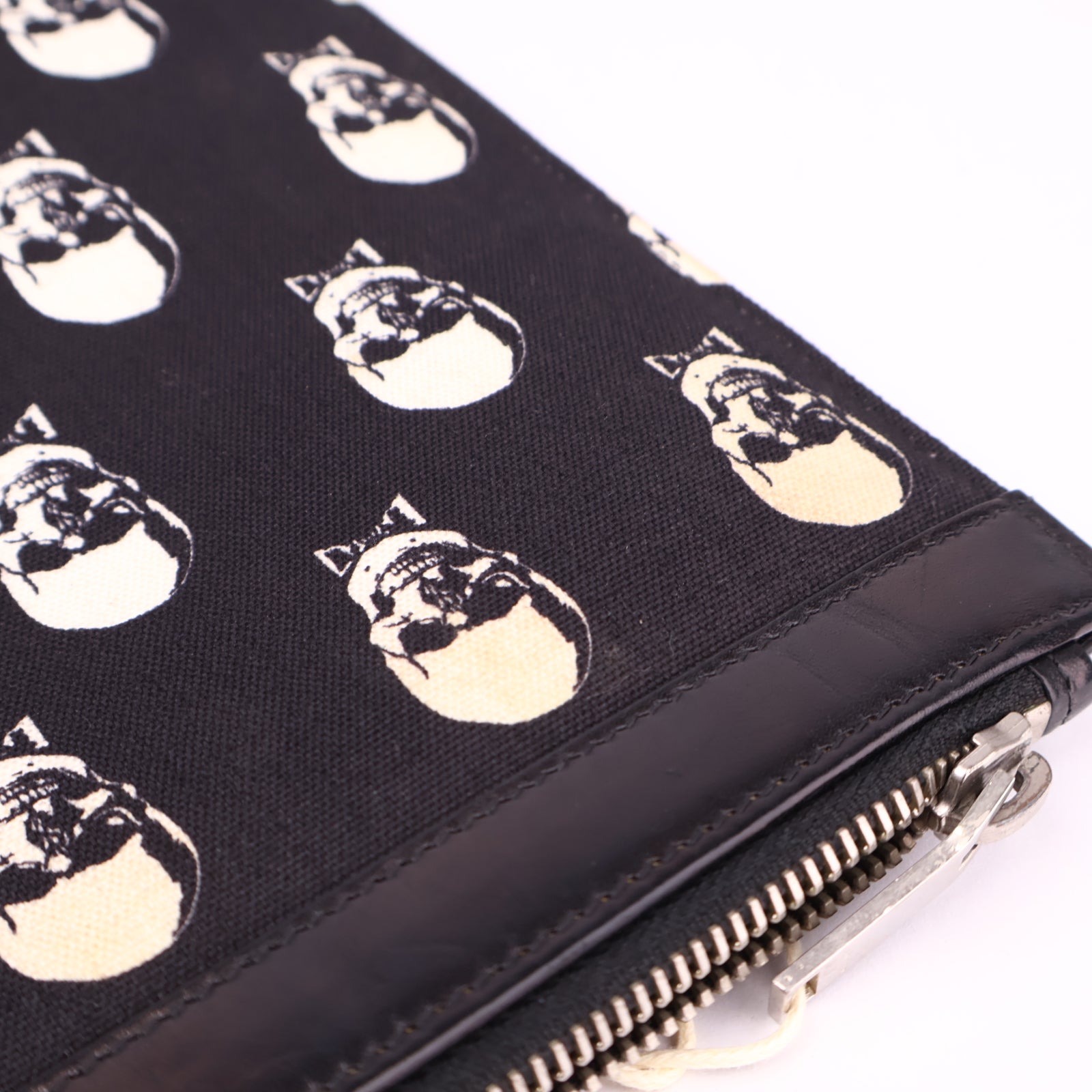 J3588 Saint Laurent Canvas Skull Clutch- Pre Owned