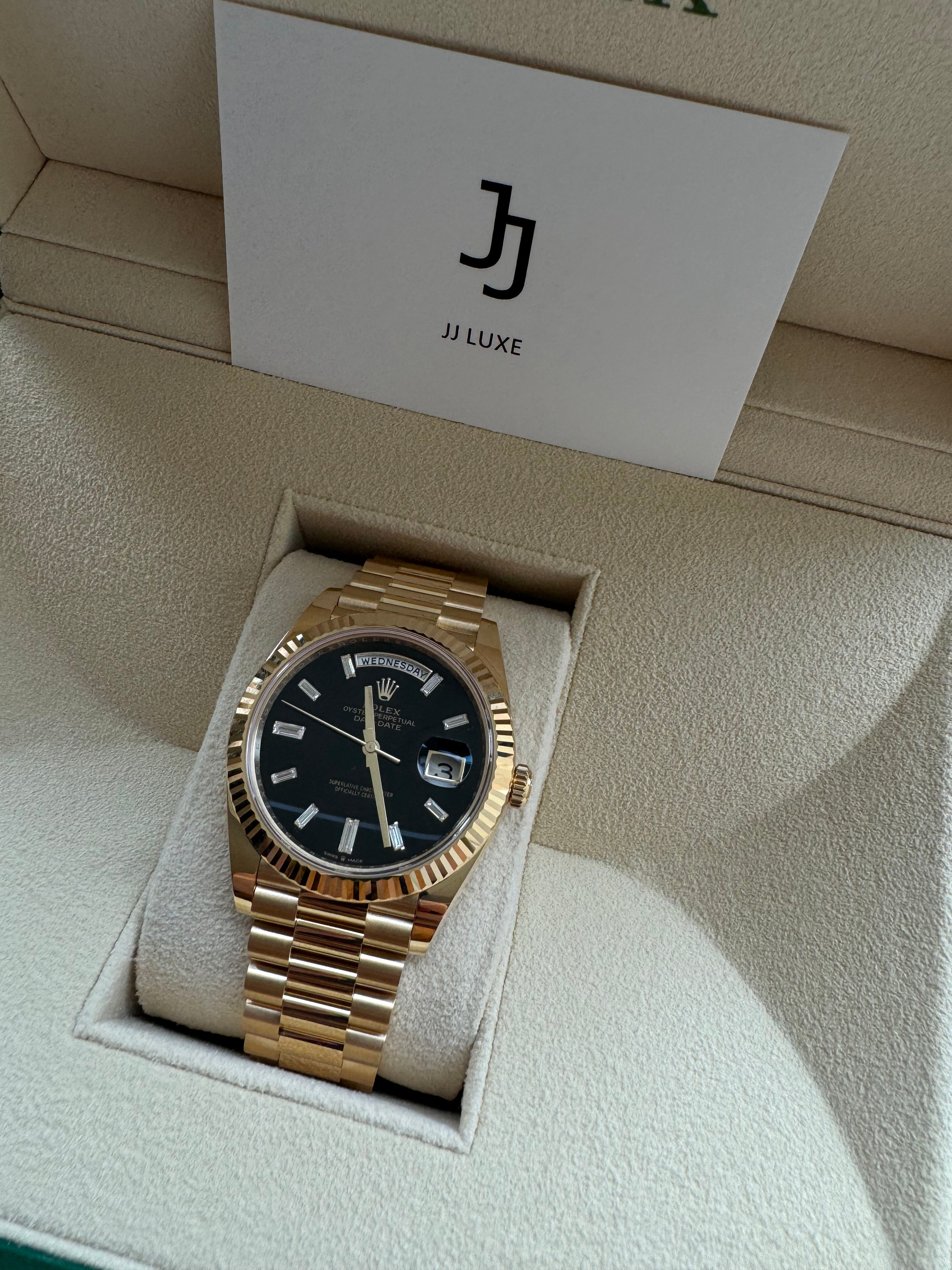 Rolex Day-Date 40mm 228238 Yellow Gold Black Diamond Dial