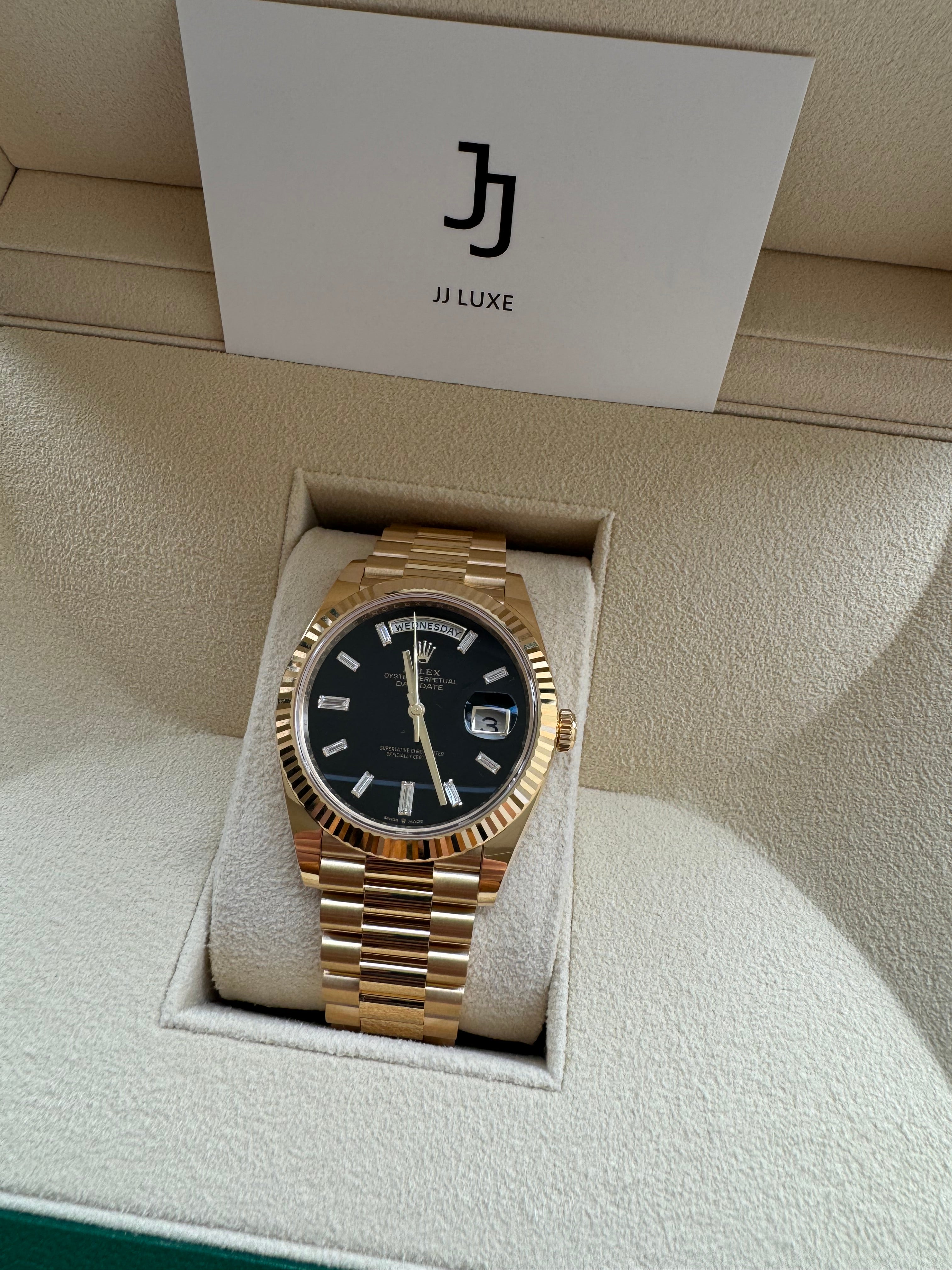 Rolex Day-Date 40mm 228238 Yellow Gold Black Diamond Dial