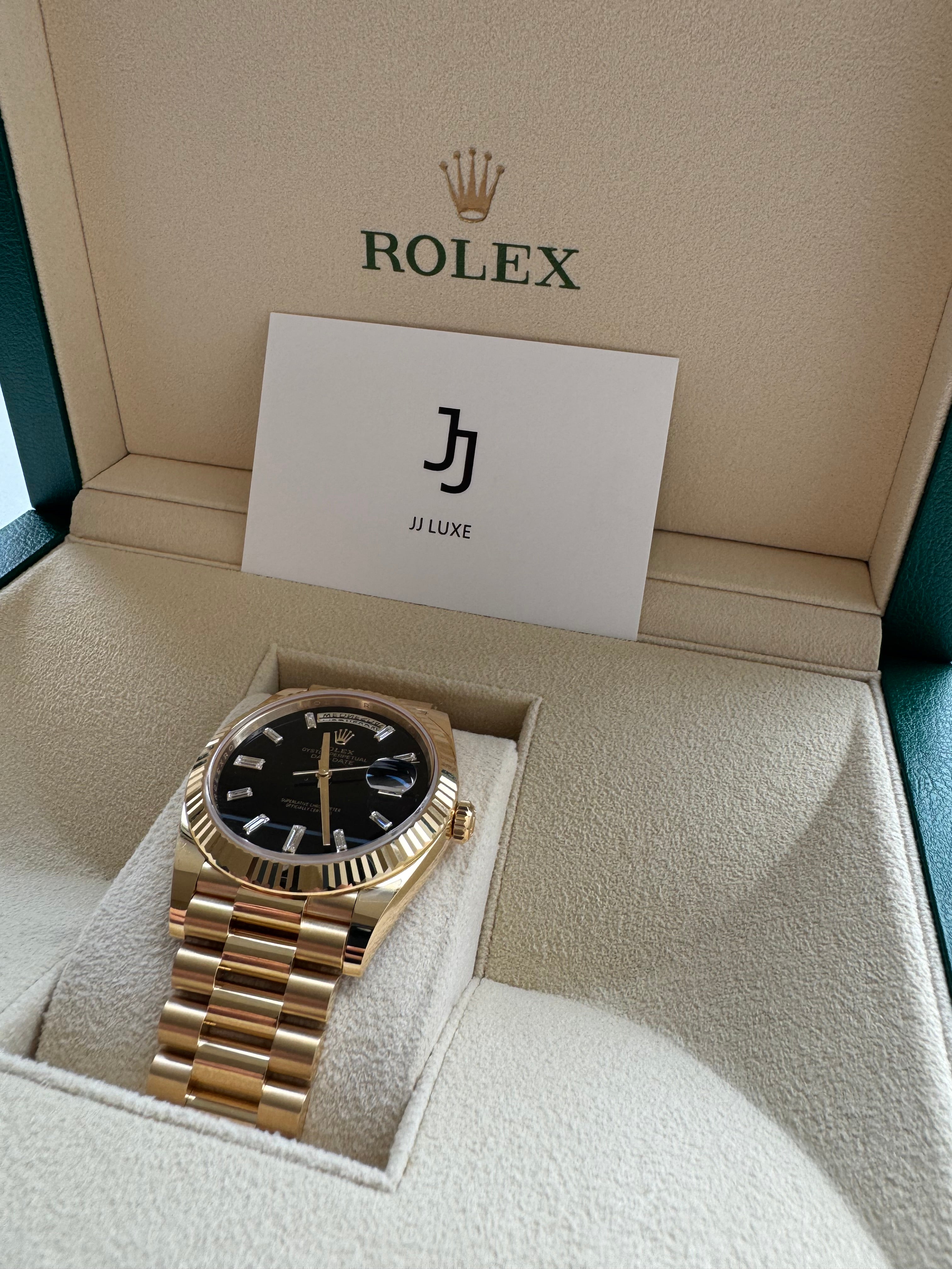 Rolex Day-Date 40mm 228238 Yellow Gold Black Diamond Dial