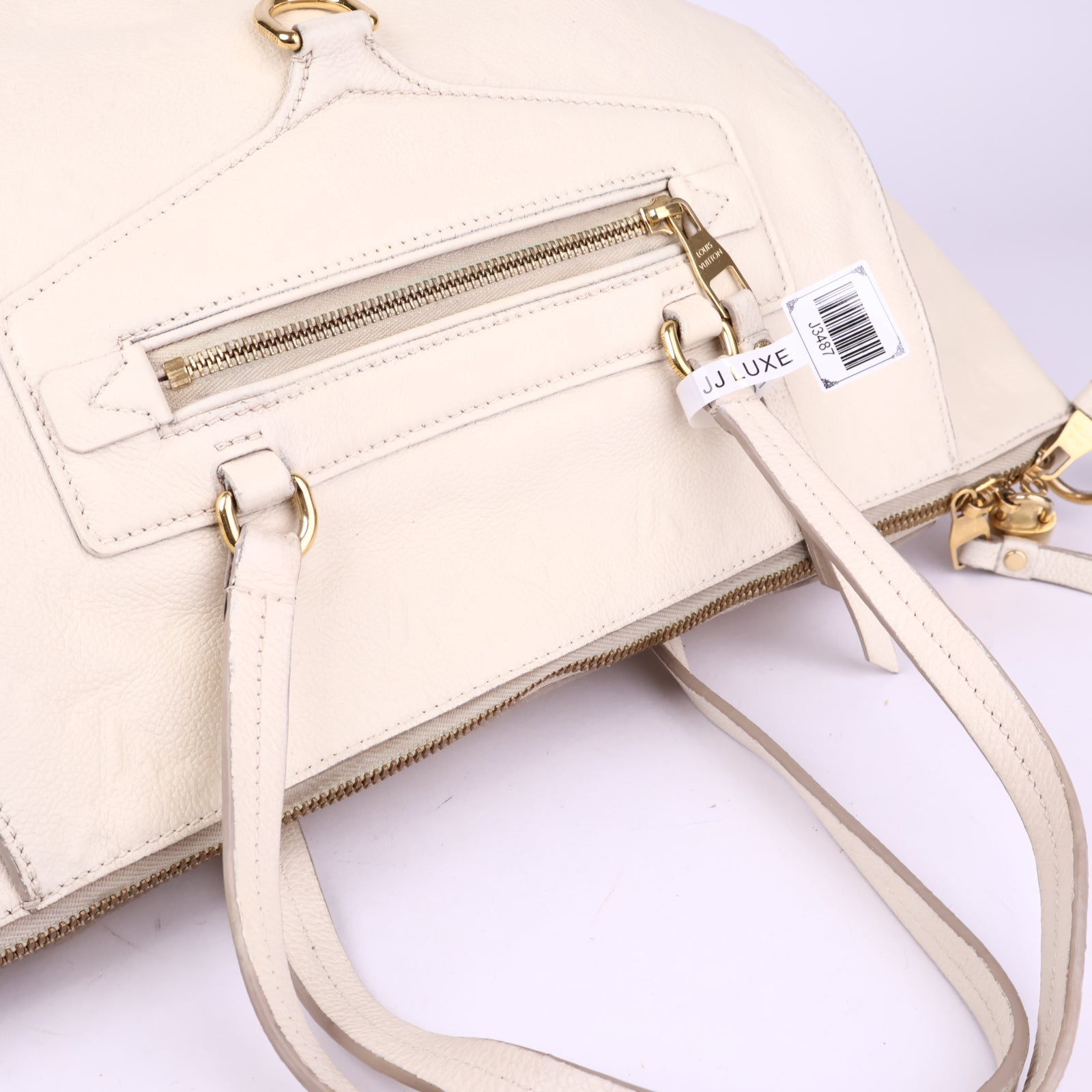 J3487# Louis Vuitton Neige Monogram Empreinte Leather Lumineuse- Pre Owned