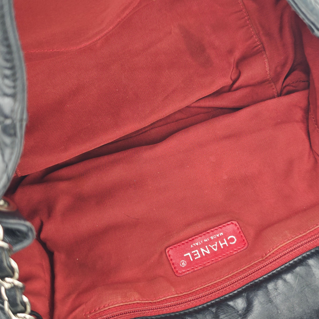 C2900 Chanel Shoulder Bag In The Business Flap Bag Distressed Calfskin | Pre-Owned Very Good Calfskin leather