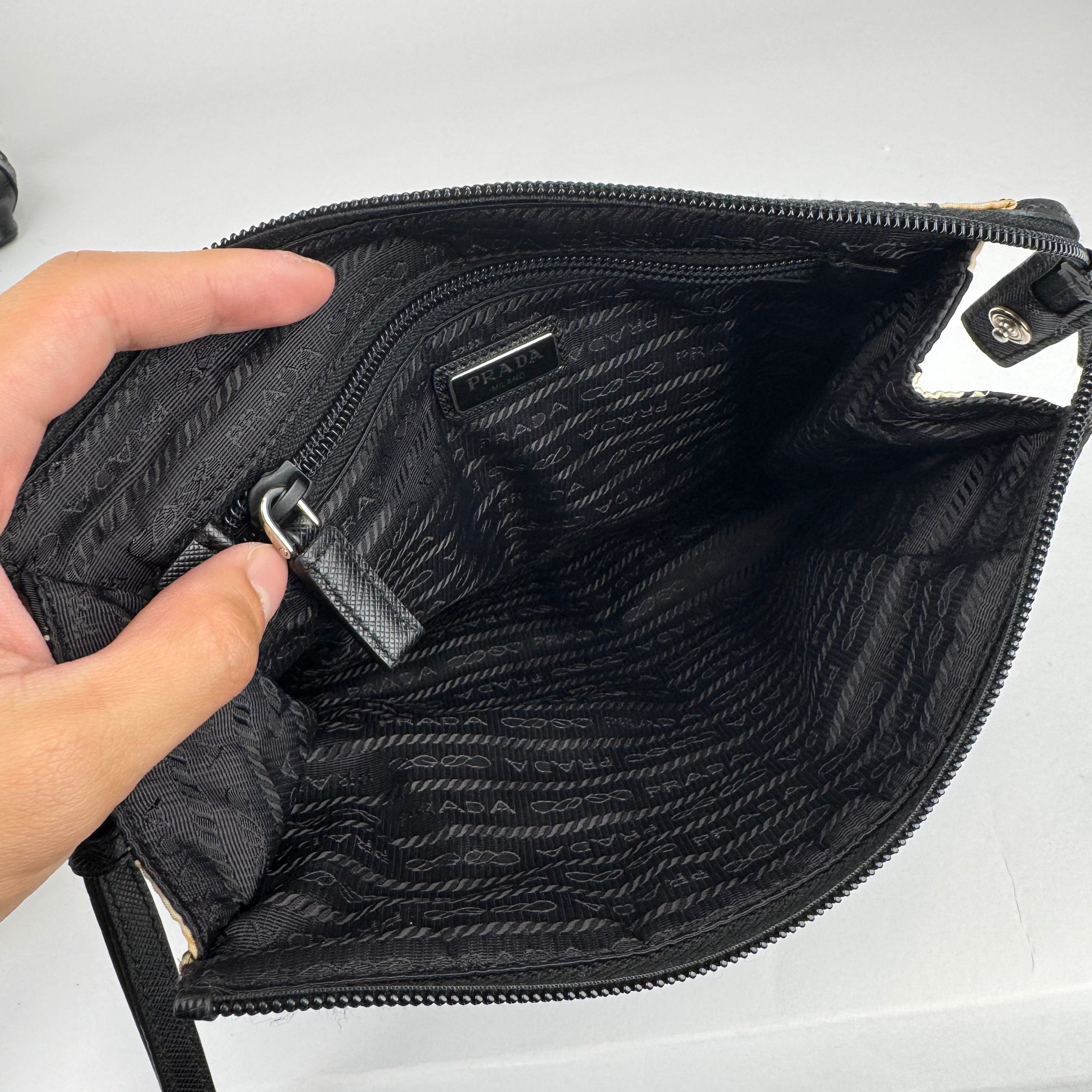 J0774 Prada Cartoon Print Clutch In Black - Pre Owned