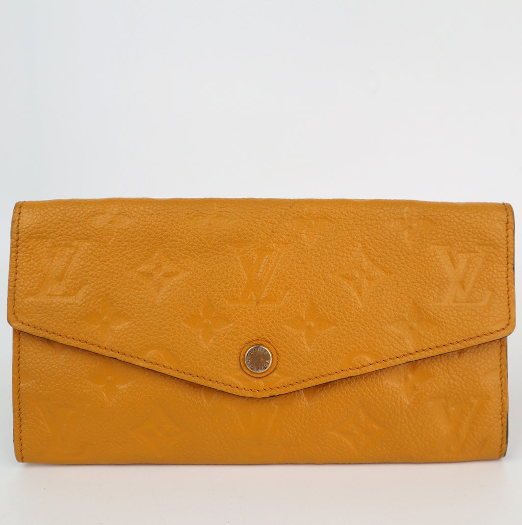 C2200 Louis Vuitton Long Wallet Monogram Empreinte Long Wallet | Pre-Owned Very Good Safran Yellow embossed leather
