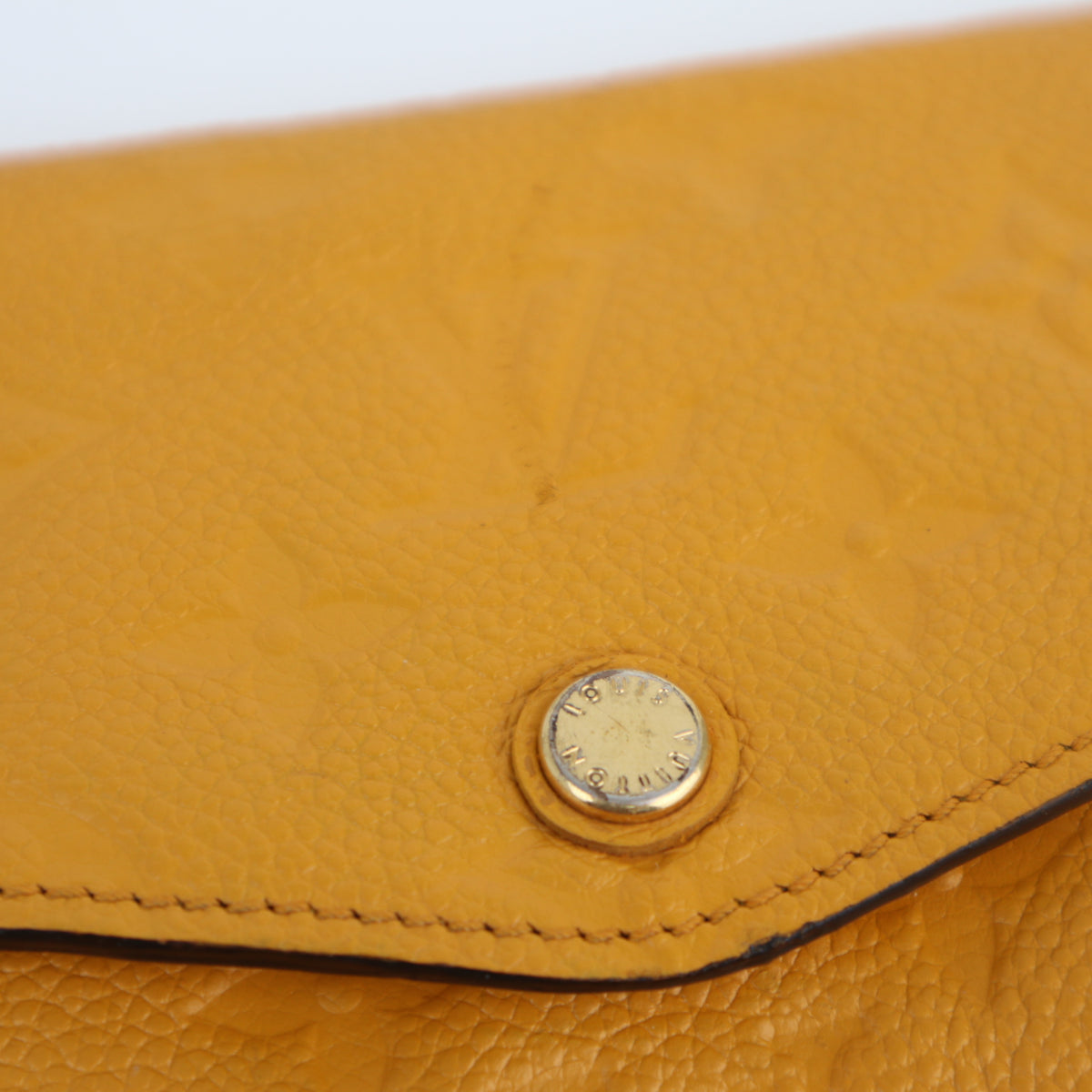C2200 Louis Vuitton Long Wallet Monogram Empreinte Long Wallet | Pre-Owned Very Good Safran Yellow embossed leather