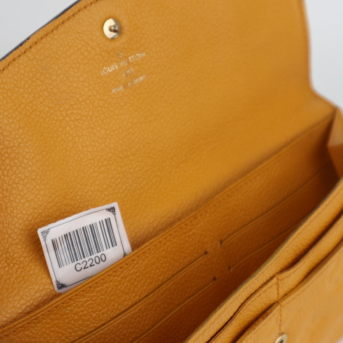 C2200 Louis Vuitton Long Wallet Monogram Empreinte Long Wallet | Pre-Owned Very Good Safran Yellow embossed leather