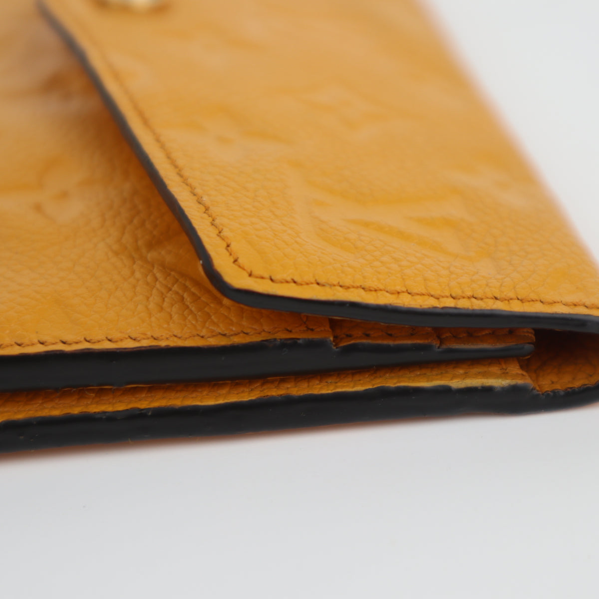C2200 Louis Vuitton Long Wallet Monogram Empreinte Long Wallet | Pre-Owned Very Good Safran Yellow embossed leather