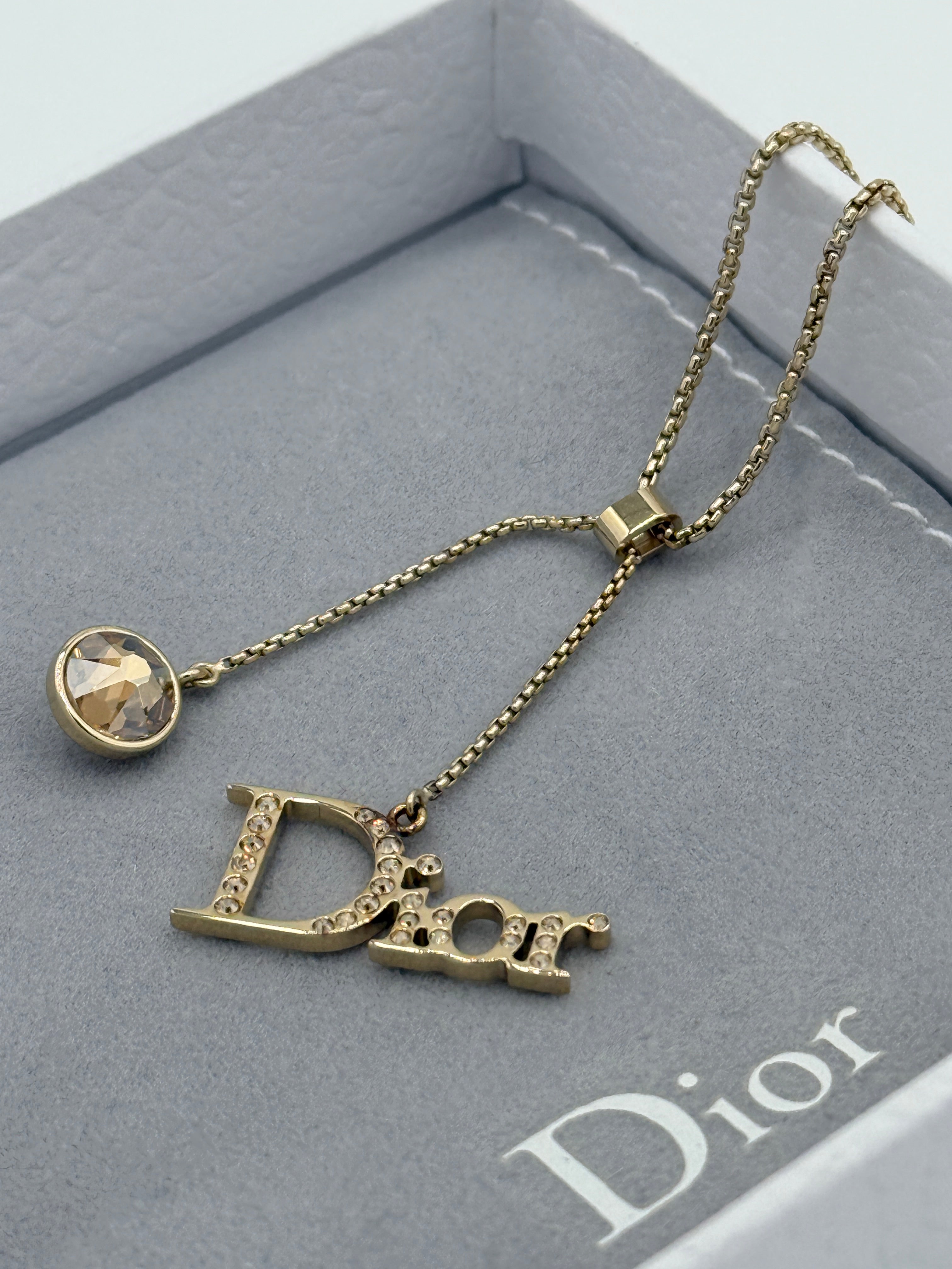 Dior Crystal Gold Tone Charm Bracelet
