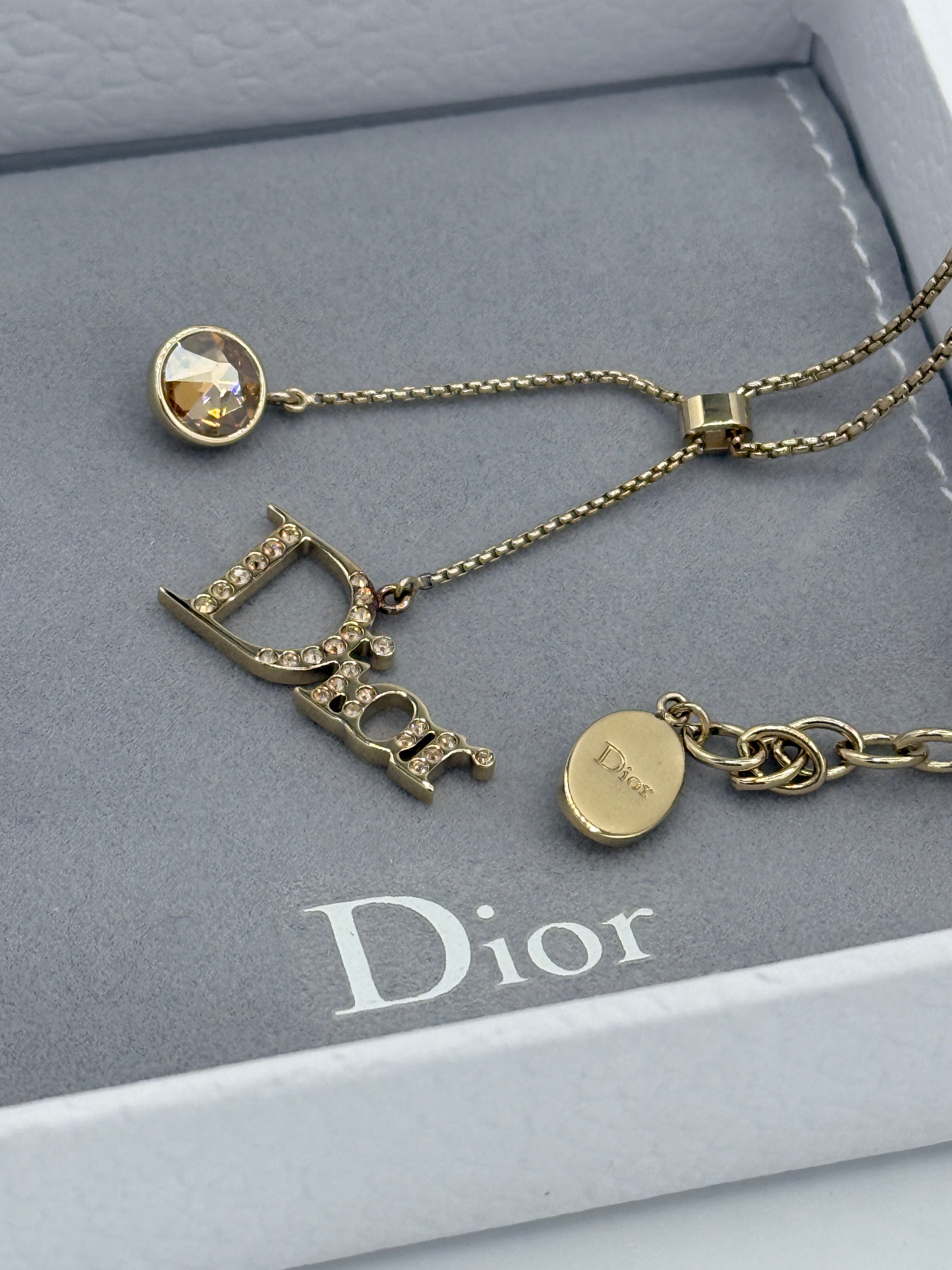 Dior Crystal Gold Tone Charm Bracelet