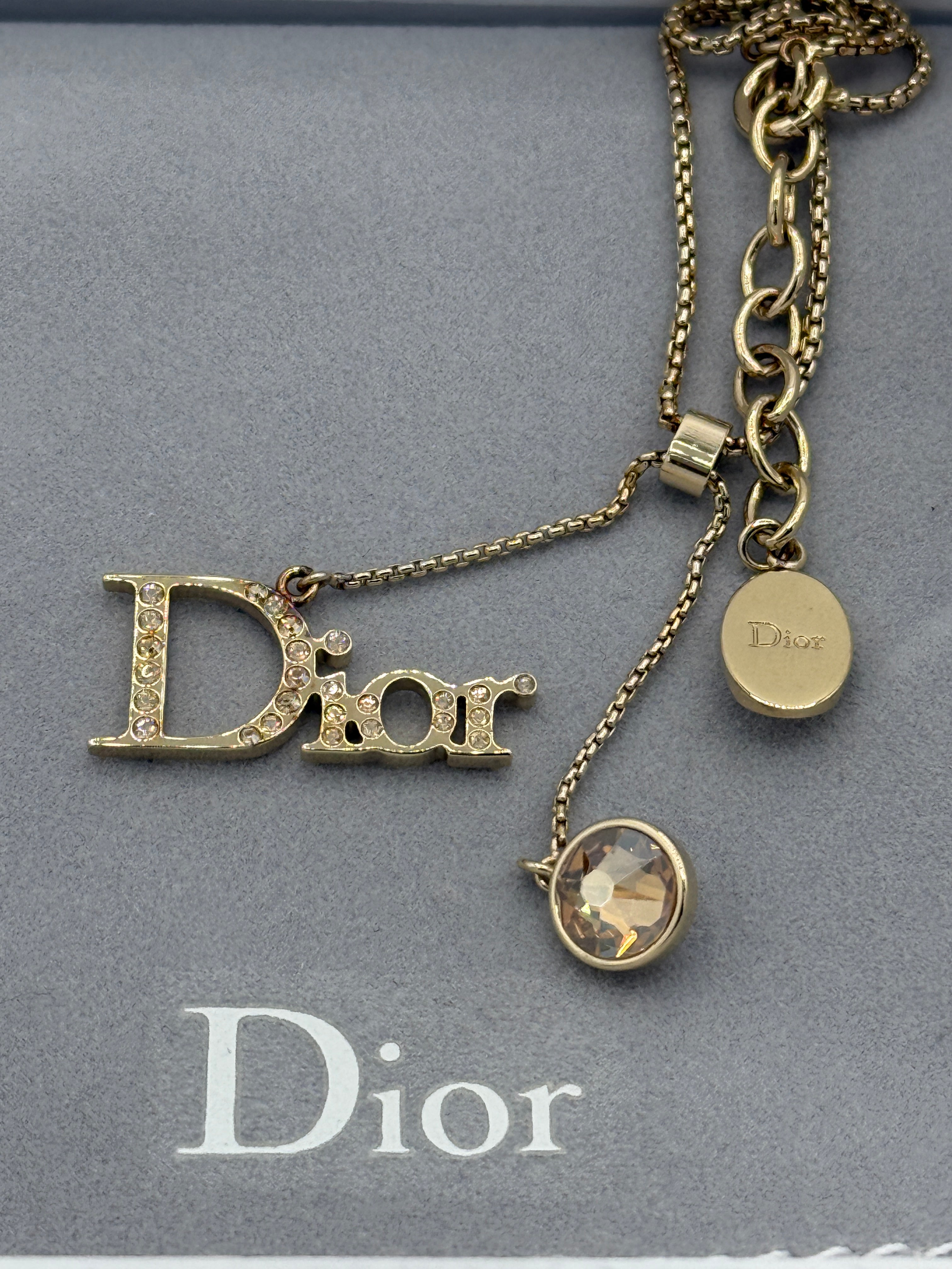 Dior Crystal Gold Tone Charm Bracelet