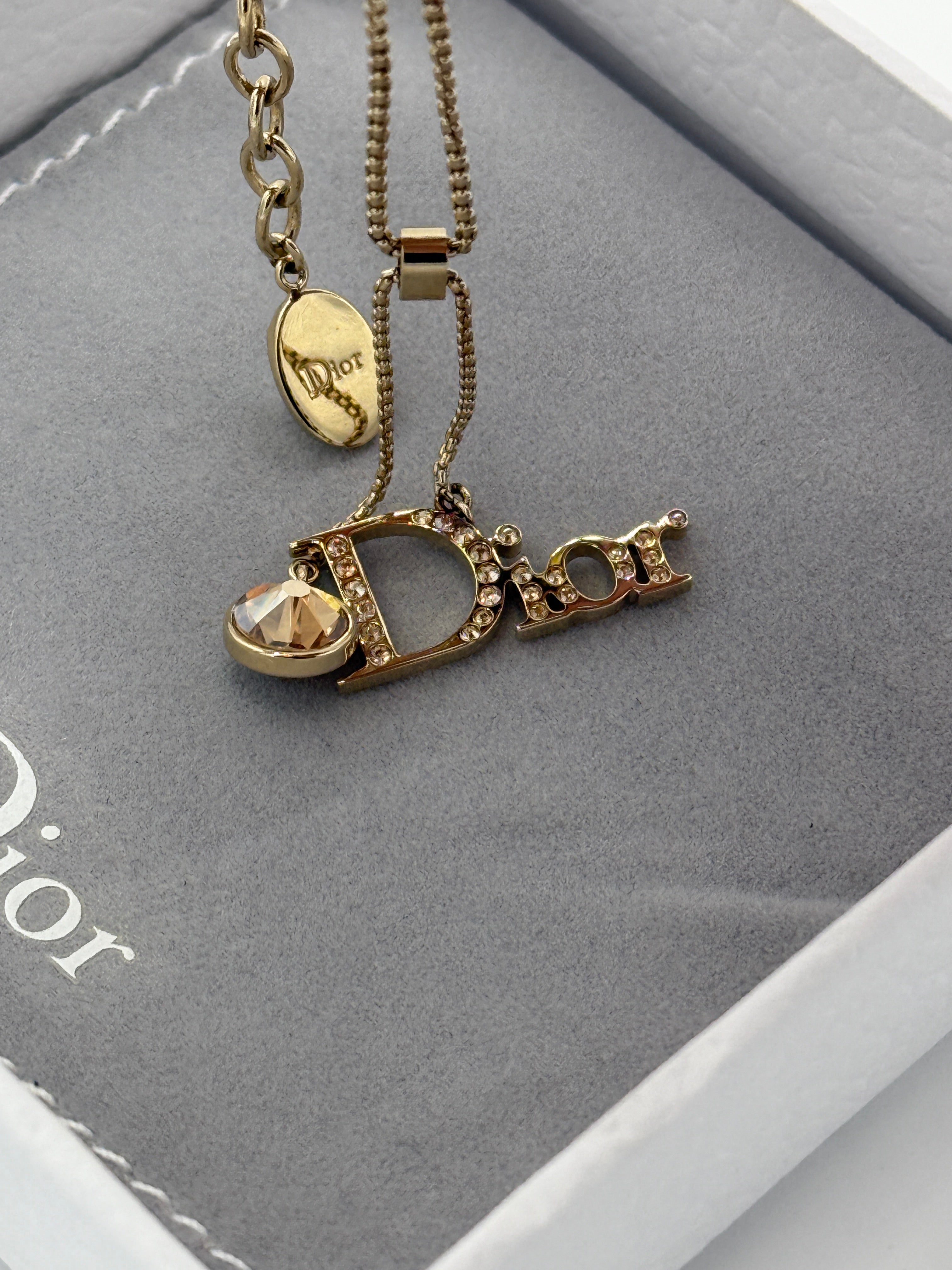 Dior Crystal Gold Tone Charm Bracelet