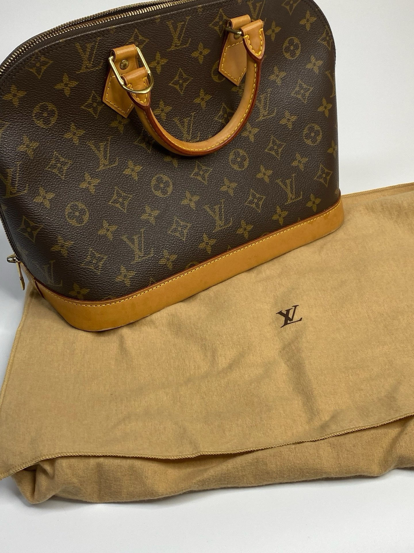 J2914 Louis Vuitton Top Handle Bag Monogram Alma PM | Pre-Owned Brown Monogram Coated canvas, Leather trim