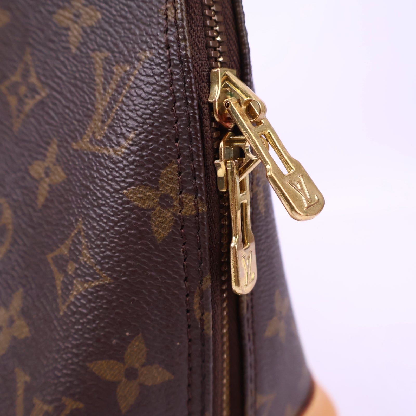 J3188R Louis Vuitton Top Handle Bag Alma PM Monogram Canvas | Pre-Owned Like New Brown Coated canvas, leather trim Monogram