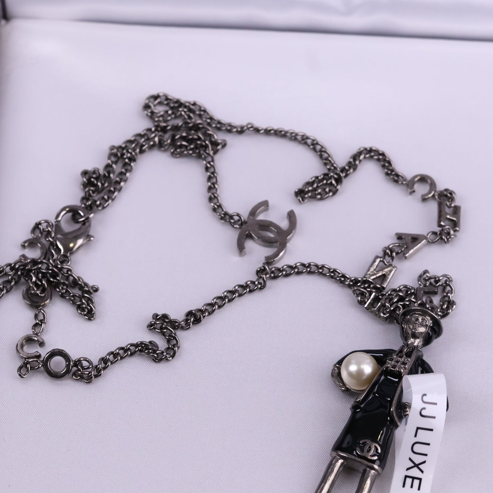 J3234 Chanel Pendant Necklace CC Coco Mademoiselle Figurine Pendant | Pre-Owned Excellent Gold-tone Logo Metal
