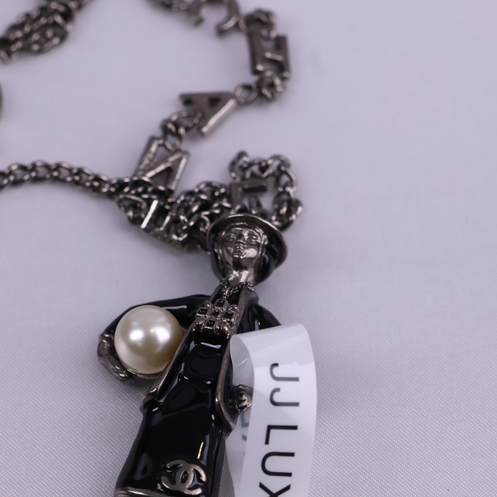 J3234 Chanel Pendant Necklace CC Coco Mademoiselle Figurine Pendant | Pre-Owned Excellent Gold-tone Logo Metal