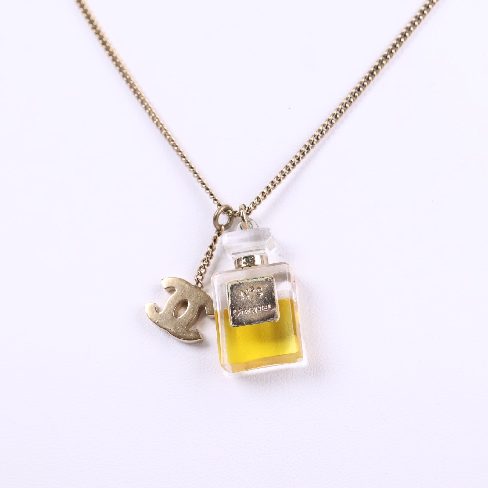J2981 Chanel Charm Necklace No. 5 Perfume Bottle Charm Necklace | Pre-Owned Like New Gold-tone Logo Metal