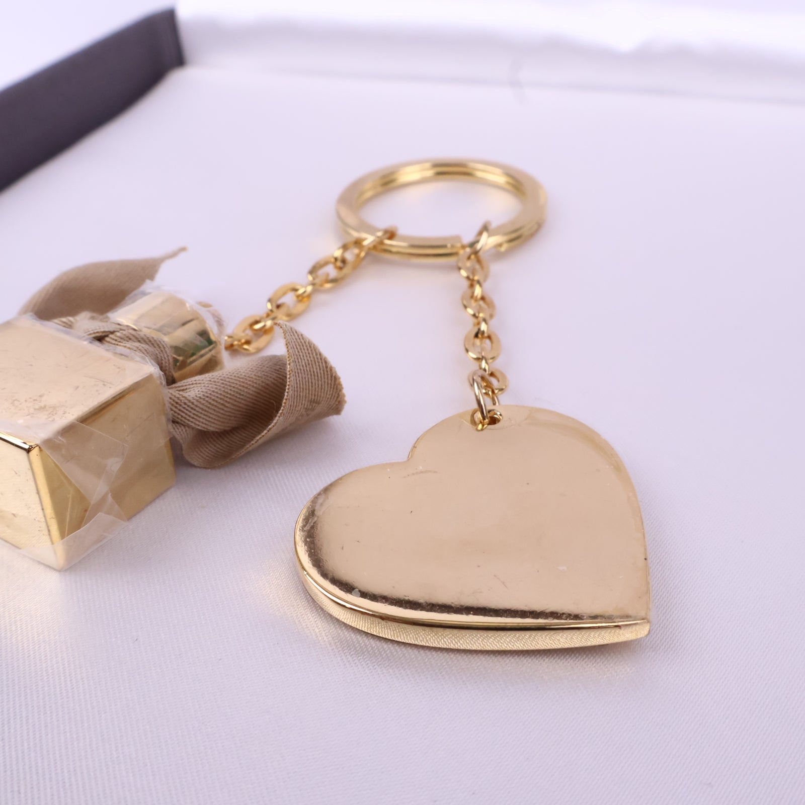 J3095 Burberry Charm / Pendant Burberry Key Holder Bag Charm Heart Bottle Motif | Pre-Owned  Metal Heart motif