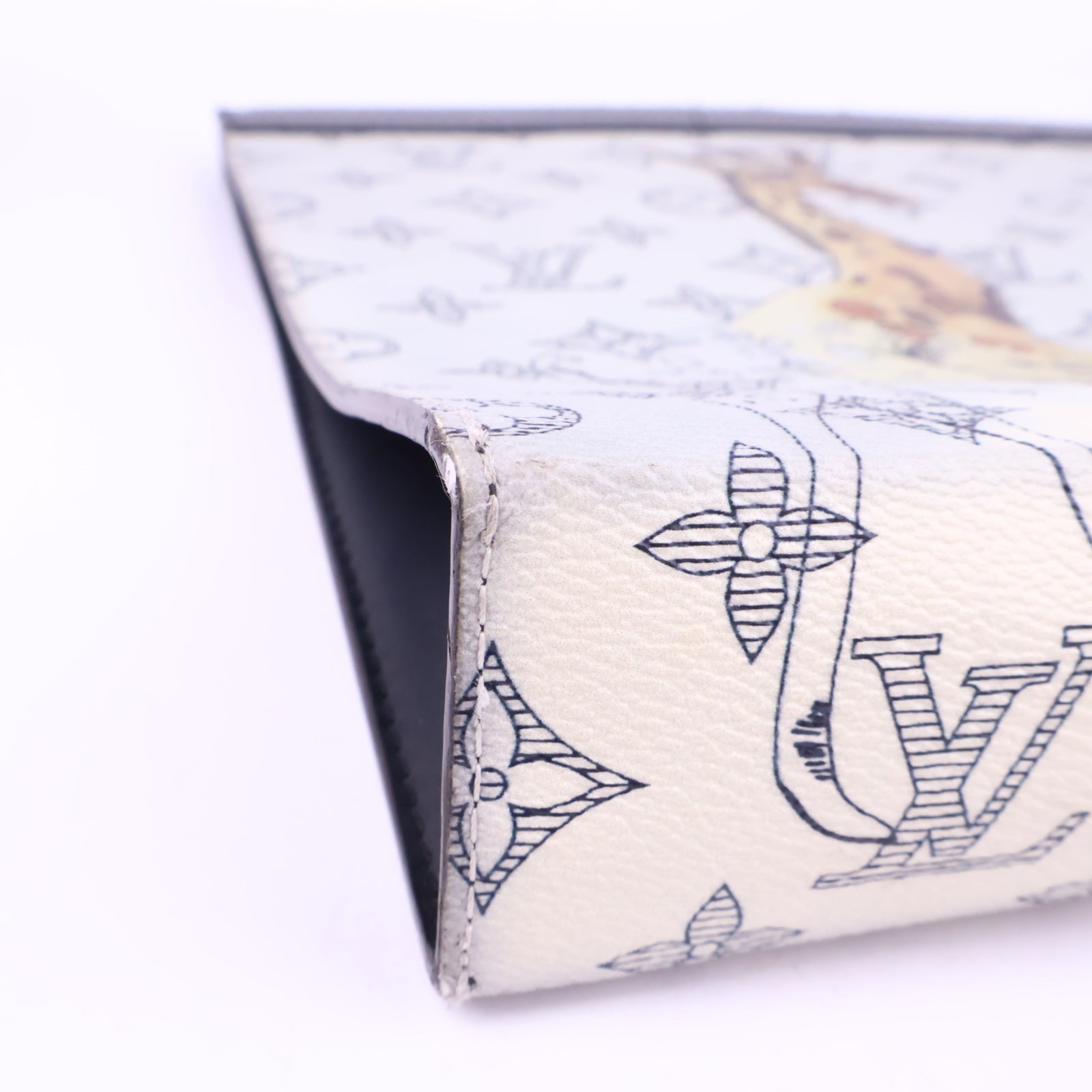 J2841 Louis Vuitton Clutch Bag Louis Vuitton x Chapman Brothers Savane Pochette Voyage | Pre-Owned Savane / Monogram Canvas