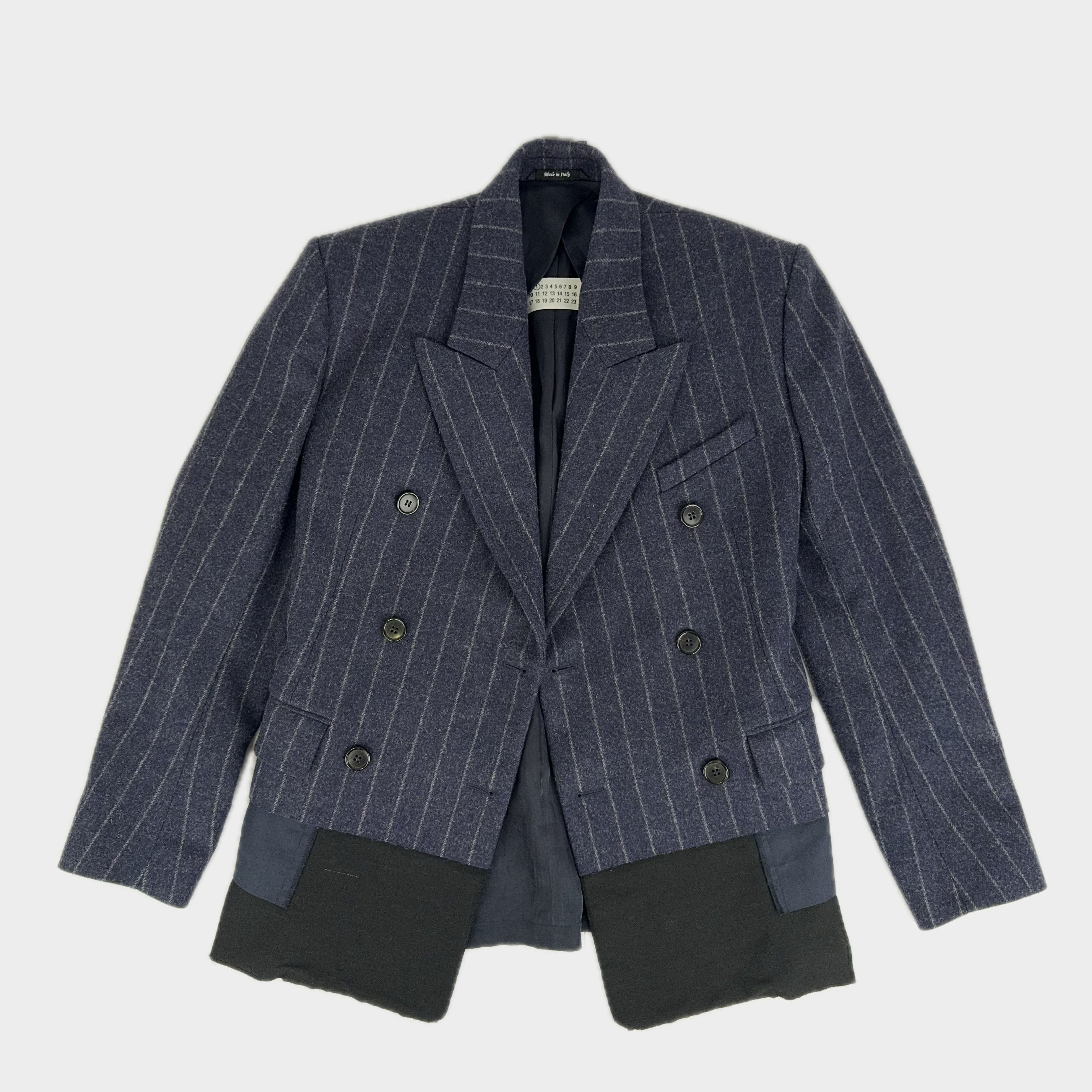PRE OWNED - MAISON MARGIELA
MM1 DOUBLE-BREASTED PEAK LAPEL PINSTRIPED BLAZER
