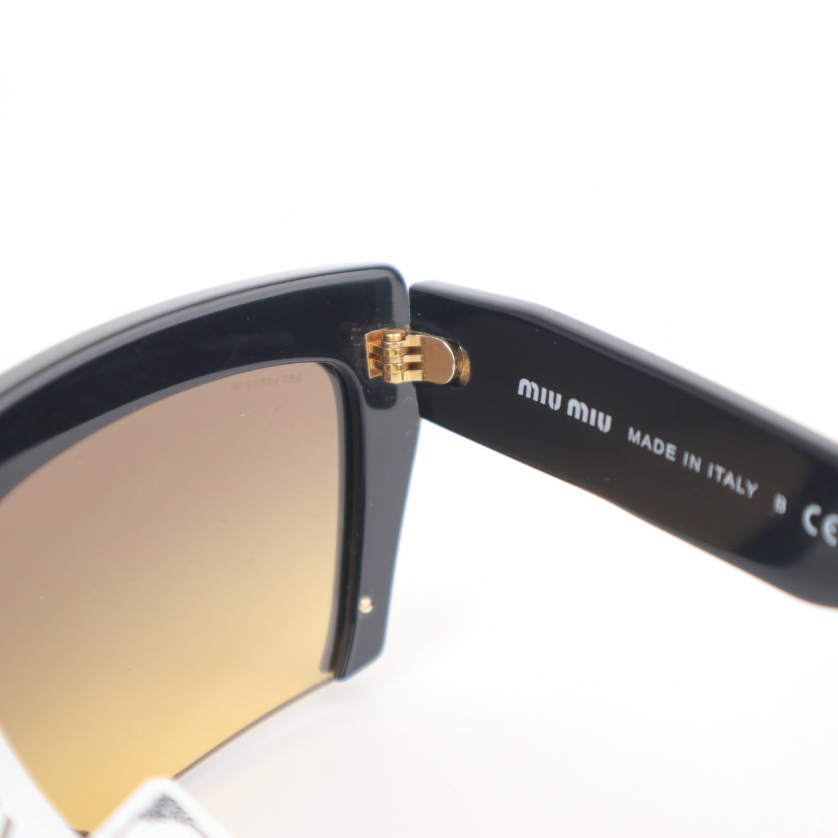 C2712 Miu Miu Sunglasses SMU110 Sunglasses | Pre-Owned Very Good Acetate / Metal