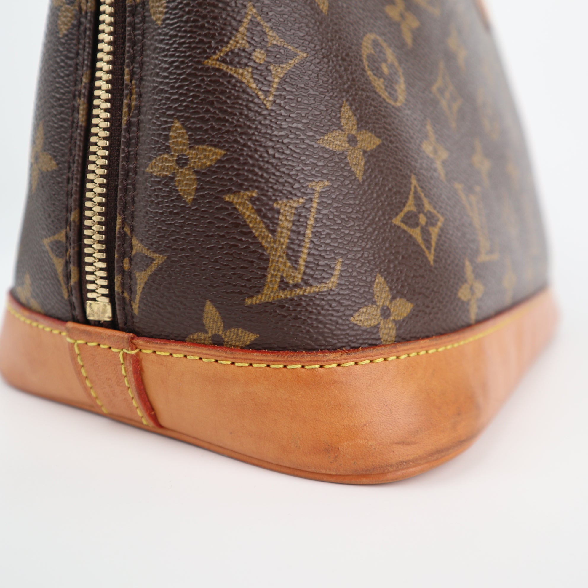 Louis Vuitton Monogram Canvas Alma PM Top Handle Bag C1857 | Pre-Owned Very Good Brown Monogram Coated canvas, leather trim