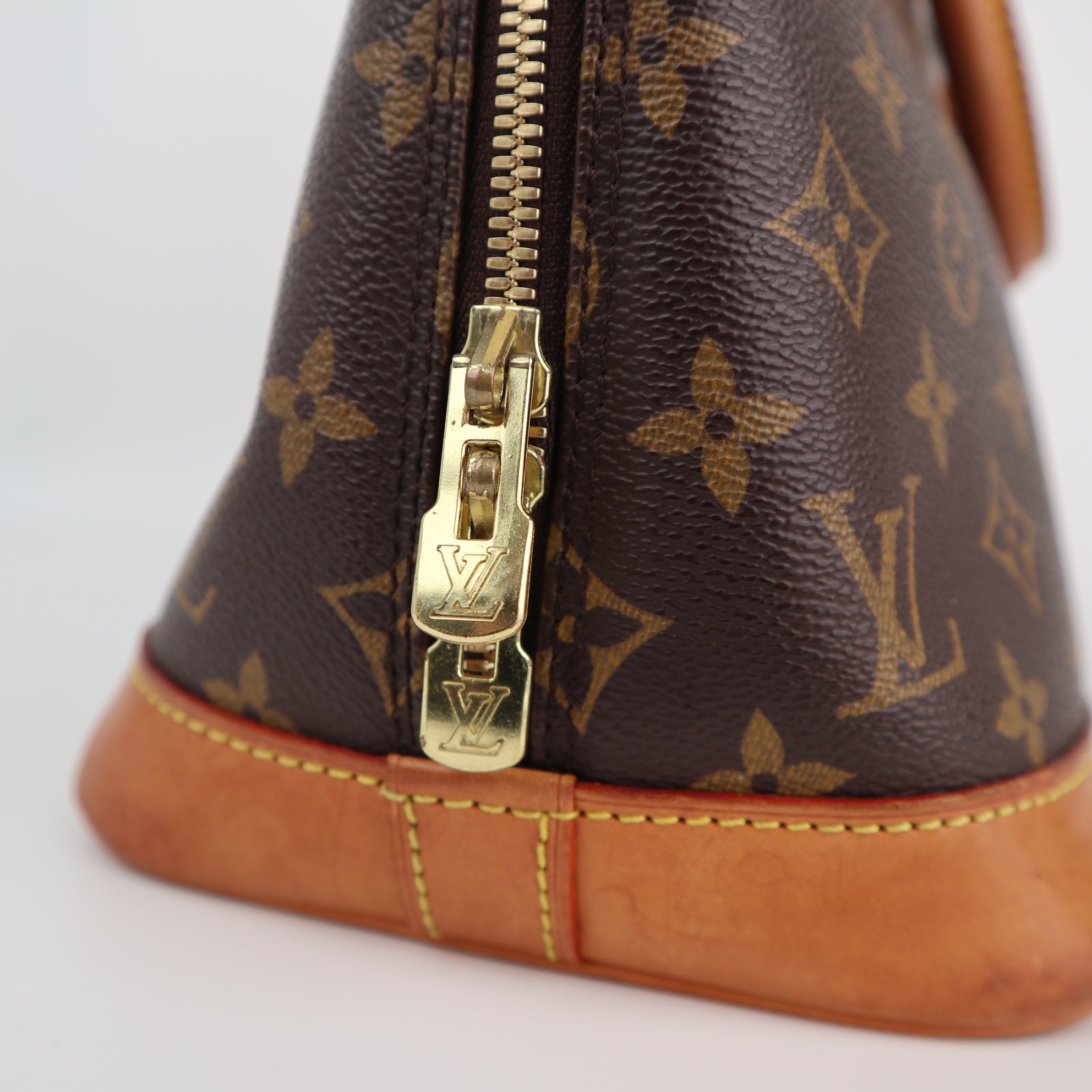 Louis Vuitton Monogram Canvas Alma PM Top Handle Bag C1857 | Pre-Owned Very Good Brown Monogram Coated canvas, leather trim