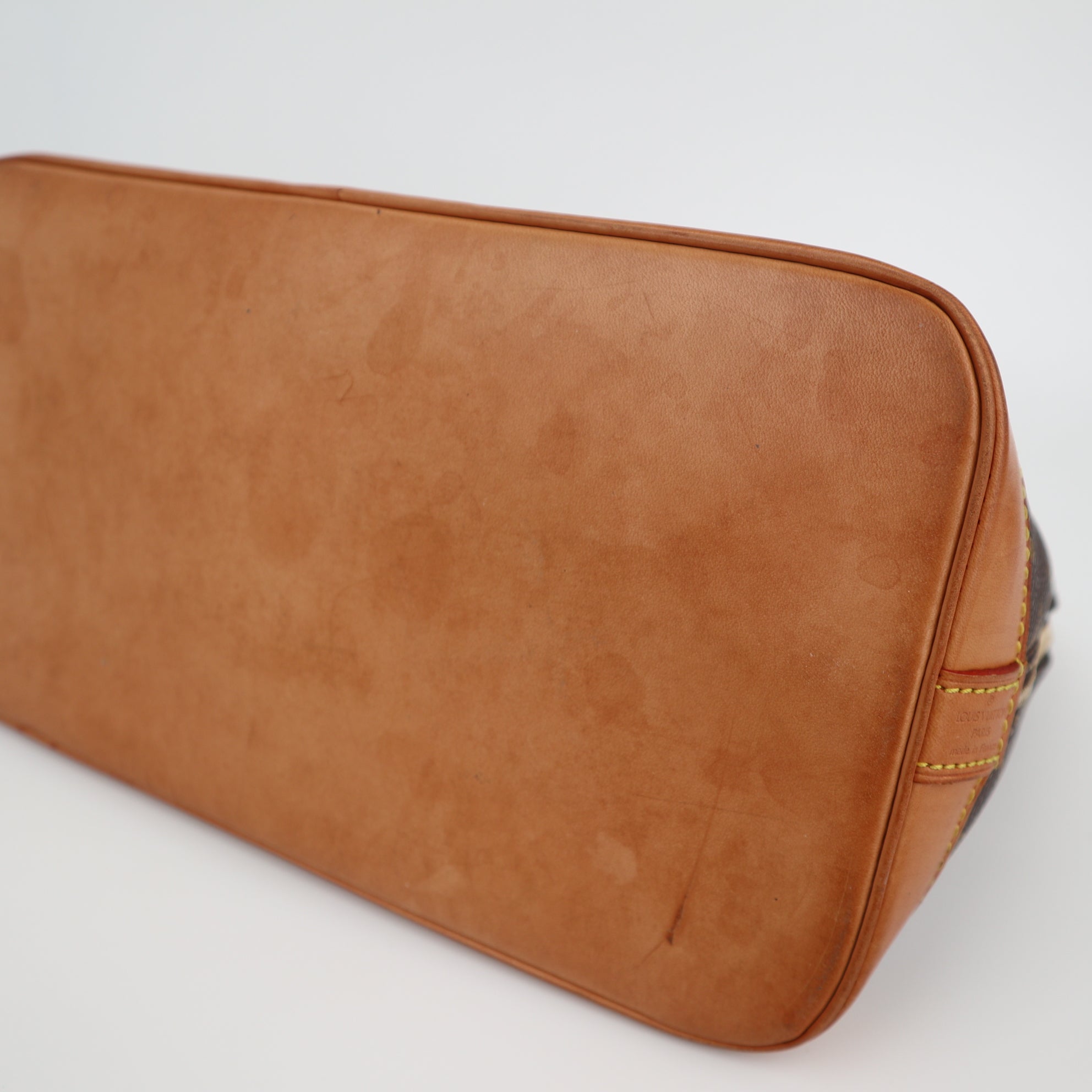 Louis Vuitton Monogram Canvas Alma PM Top Handle Bag C1857 | Pre-Owned Very Good Brown Monogram Coated canvas, leather trim