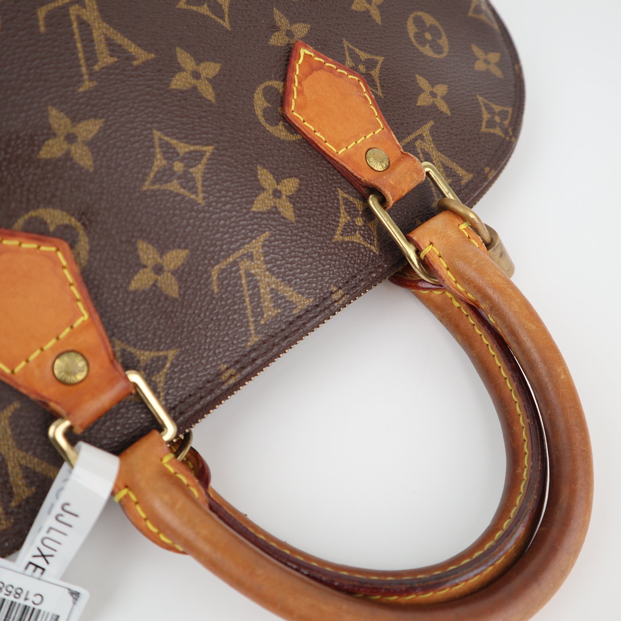 Louis Vuitton Monogram Canvas Alma PM Top Handle Bag C1858 | Pre-Owned Very Good Brown Monogram Coated canvas, leather trim