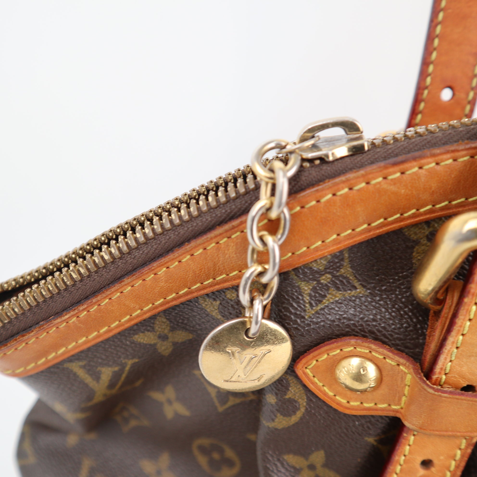 Louis Vuitton Monogram Canvas Tivoli GM Shoulder Bag C1876 | Pre-Owned Very Good Brown Monogram Coated canvas, leather trim